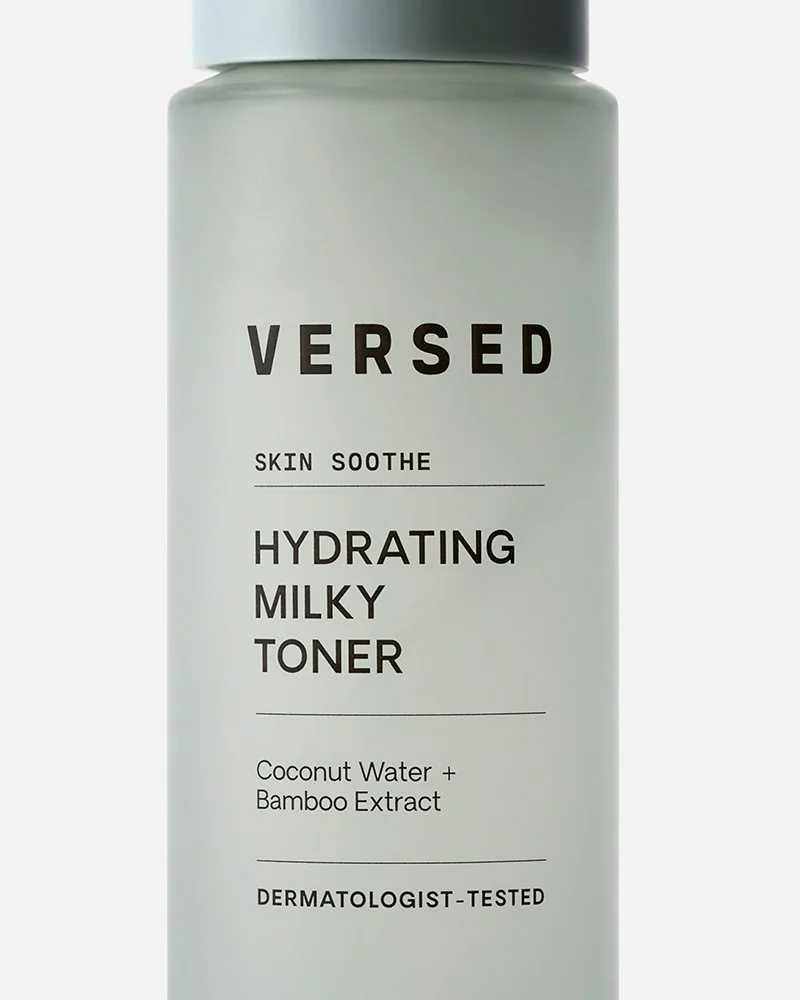 A bottle of VERS’ED Skin Soothe Hydrating Milky Toner with coconut water and bamboo extract, labeled as dermatologist-tested.