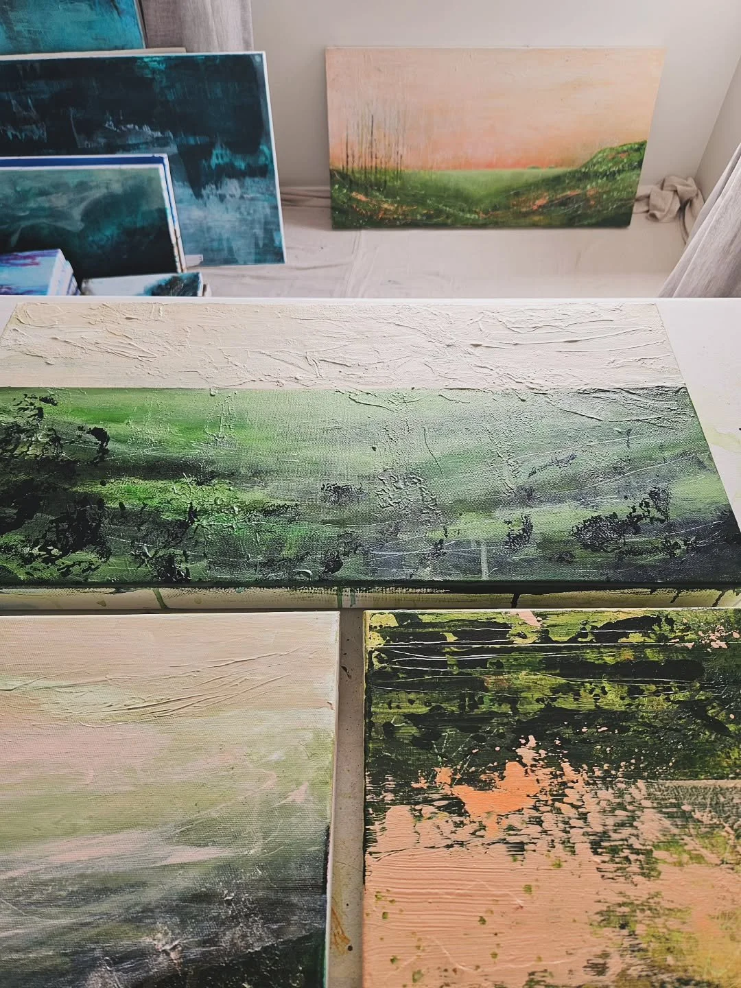 I'm working towards something big next year.
I've got quite a few paintings in various stages of completion (as you can see in this photo).

I'm painting with a few different colour palettes 🎨 

To make it easier, I've been thinking of getting anoth