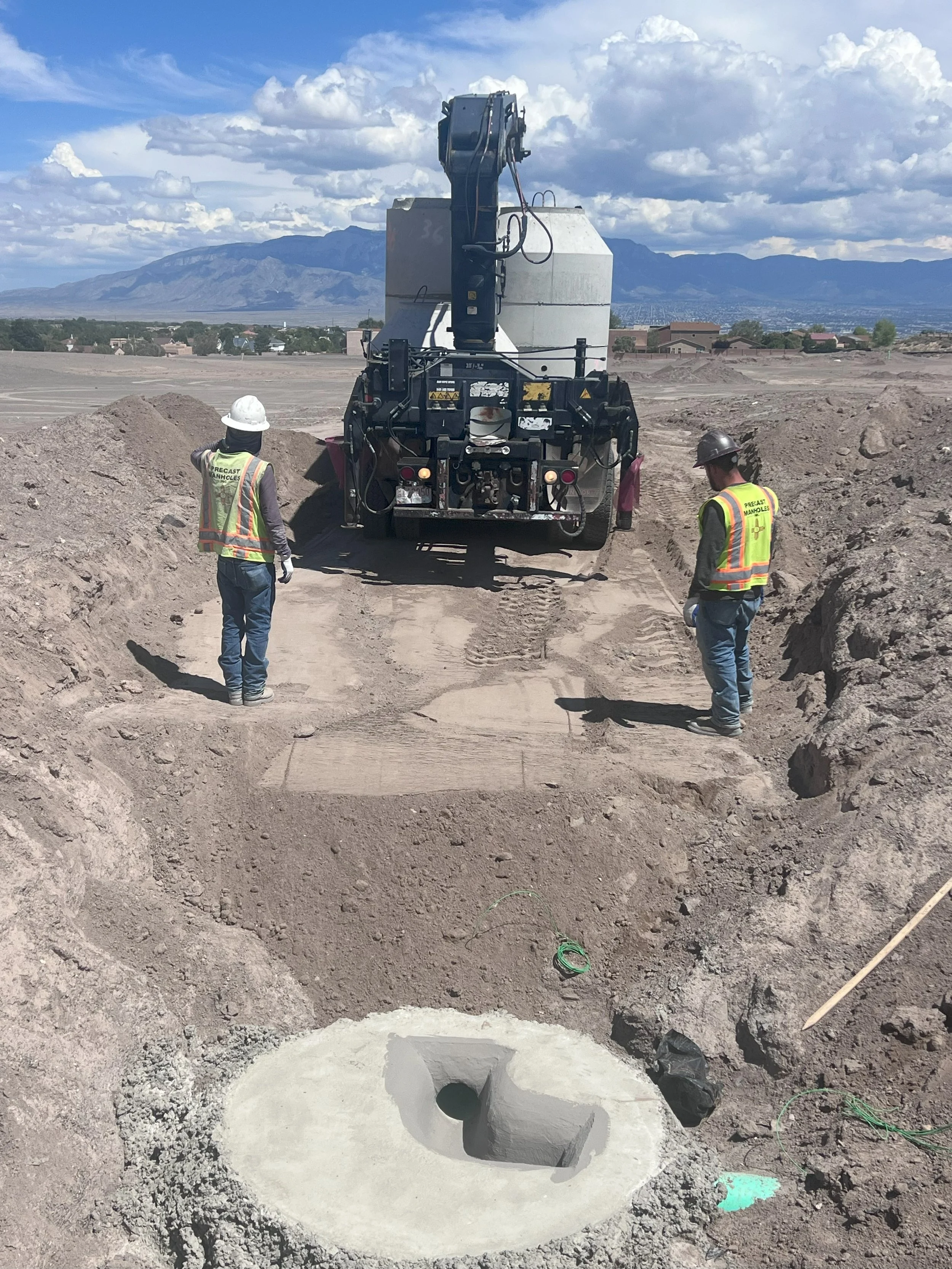 Sewer Install with Boom Truck and Sandias.jpg