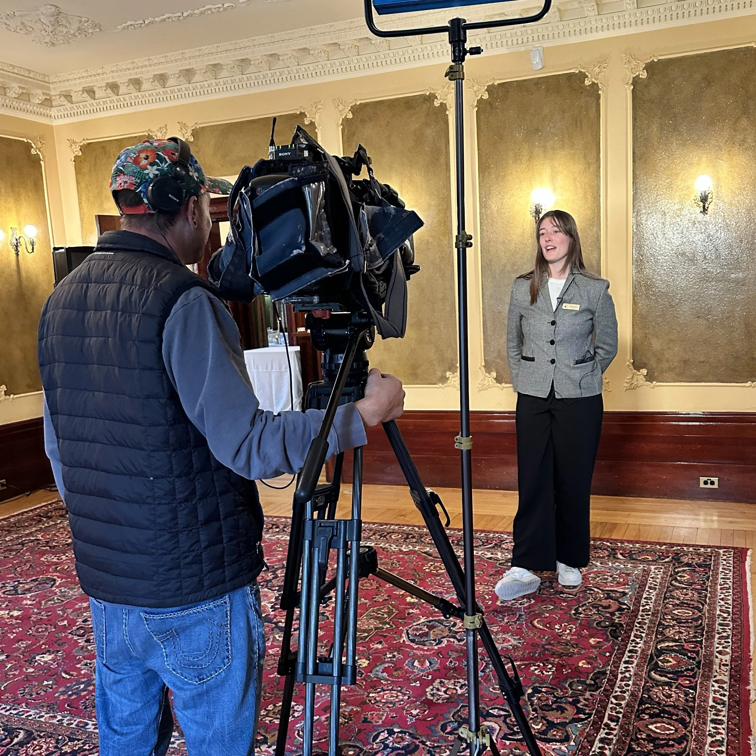 Staff member being on camera