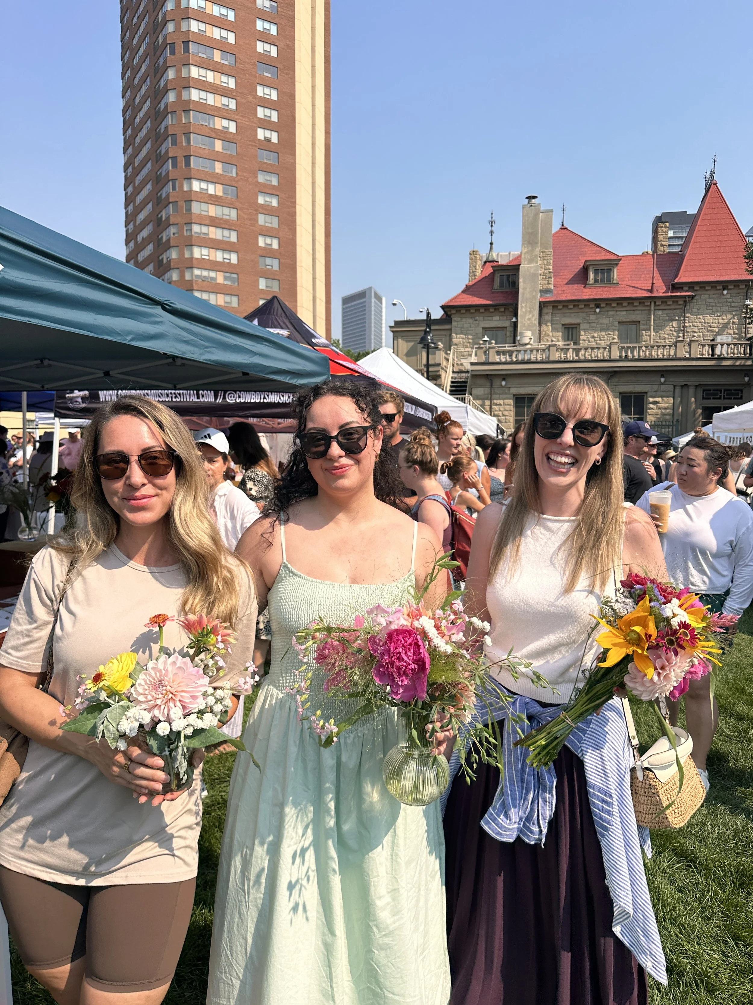 customers with their flower bouquets