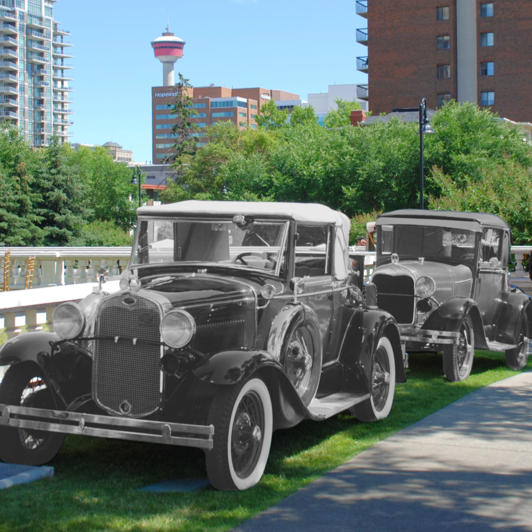 Image of the Lougheed House gardens with images of black and white vintage cars superimposed on top of it.