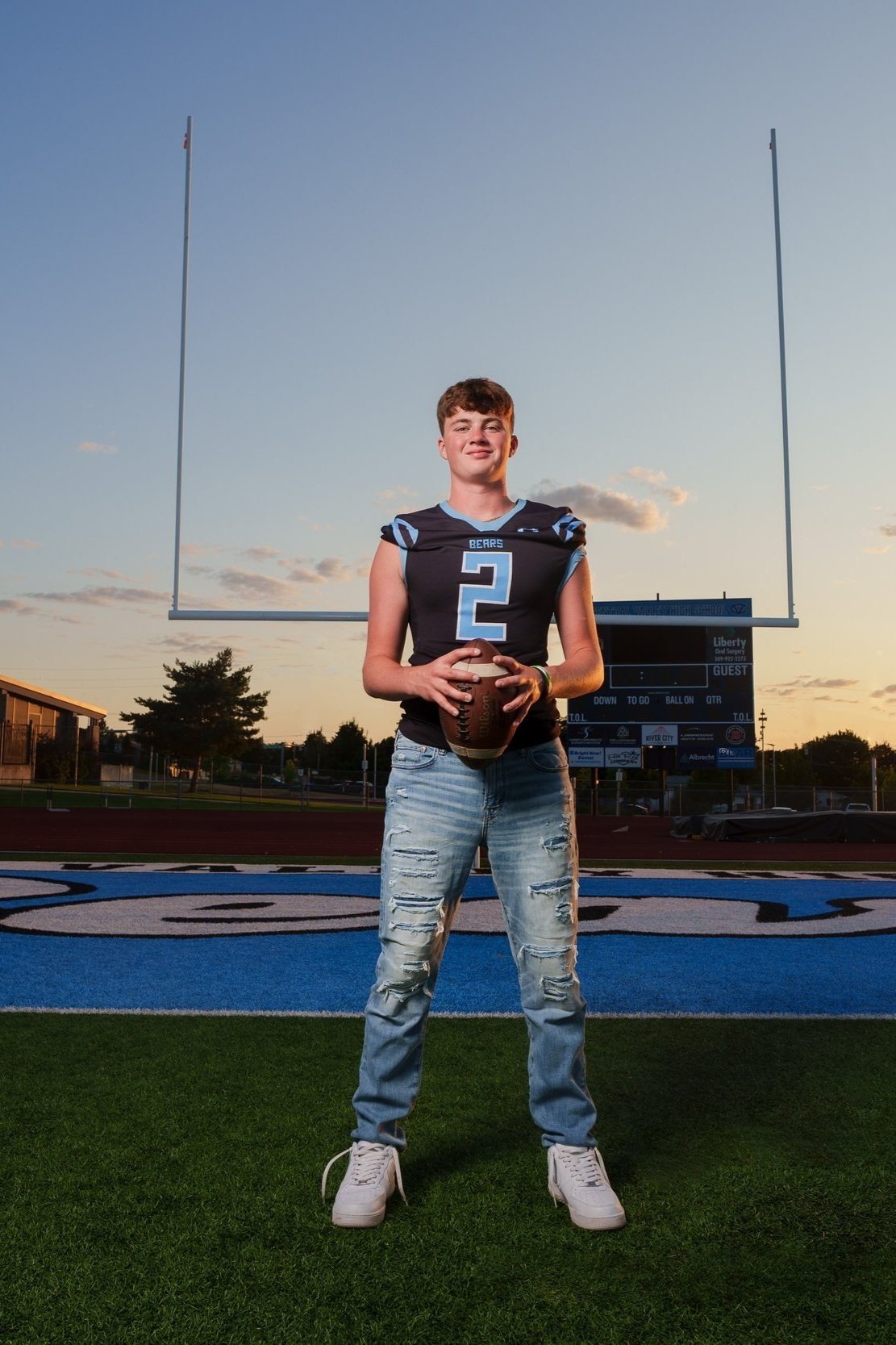C.V. high school senior portrait taken at Central Valley High school on Football field taken by Franklin Photography