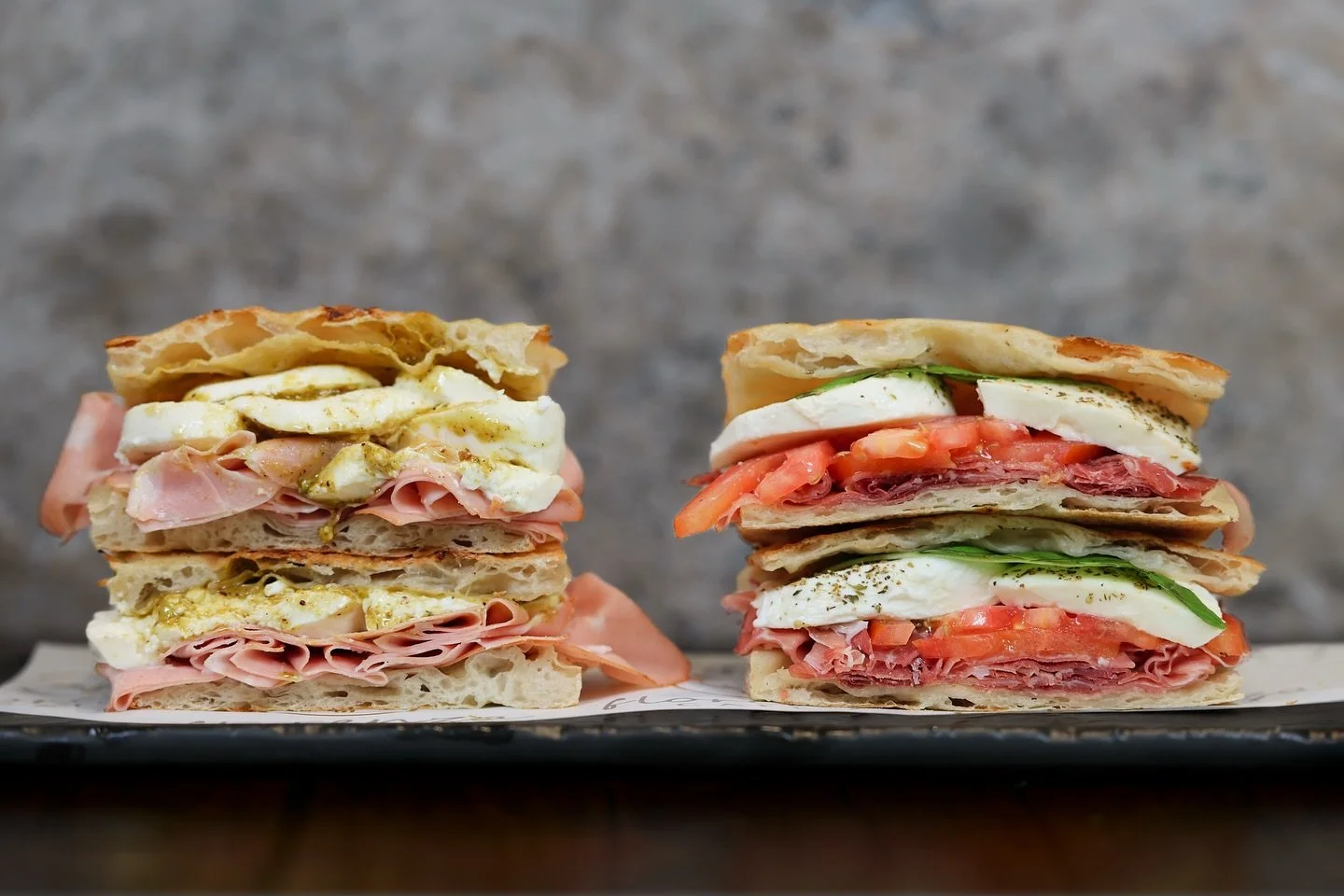 Freshly baked breads. Paninis that hit every craving. 🥪✨
Stop by and try one today &mdash; each sandwich starts with bread baked fresh daily and stacked with high-quality Italian ingredients that tell a delicious story.