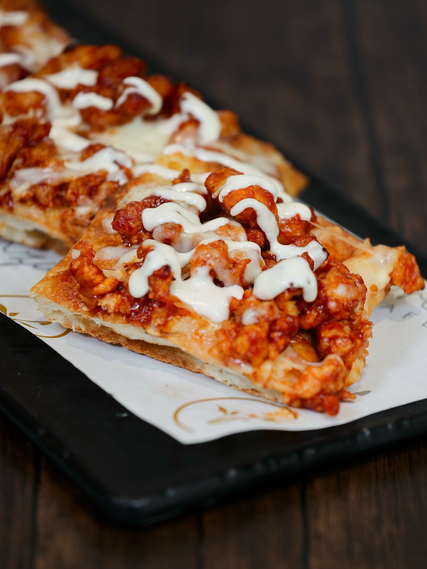 Our Buffalo Chicken Pizza hits that perfect balance &mdash; Italian tomato sauce, tender buffalo chicken, crisp celery, and just the right touch of blue cheese. A whole lot of flavor in every slice. 🍕🔥