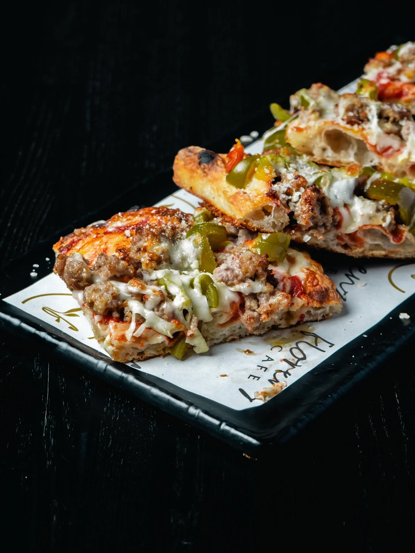The Eastie

Bold, loud, and unapologetically Italian.
Melted mozzarella blankets slices of sweet Italian sausage, hit with the fiery kick of hot cherry peppers and finished with a sharp snowfall of Pecorino Romano. Crispy edges, soft center, pure att