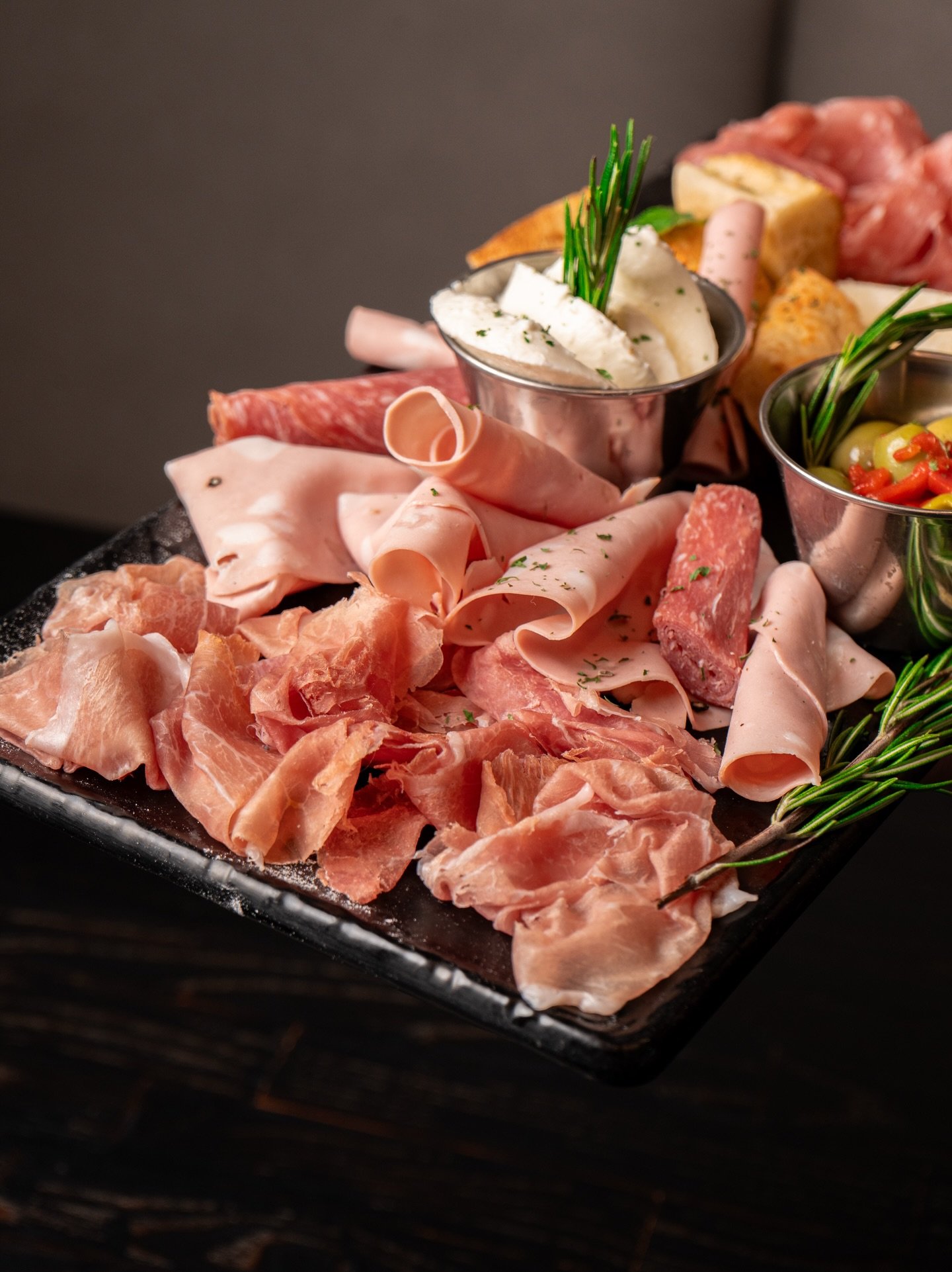 Have you tried our Charcuterie Board? 🧀🍷
Golfetta salami, Prosciutto di Parma, and Rovagnati mortadella &mdash; grab a slice, pair it with warm bread, pour a glass of wine, and pass it around the table.
Simple, classic, and exactly what you need to