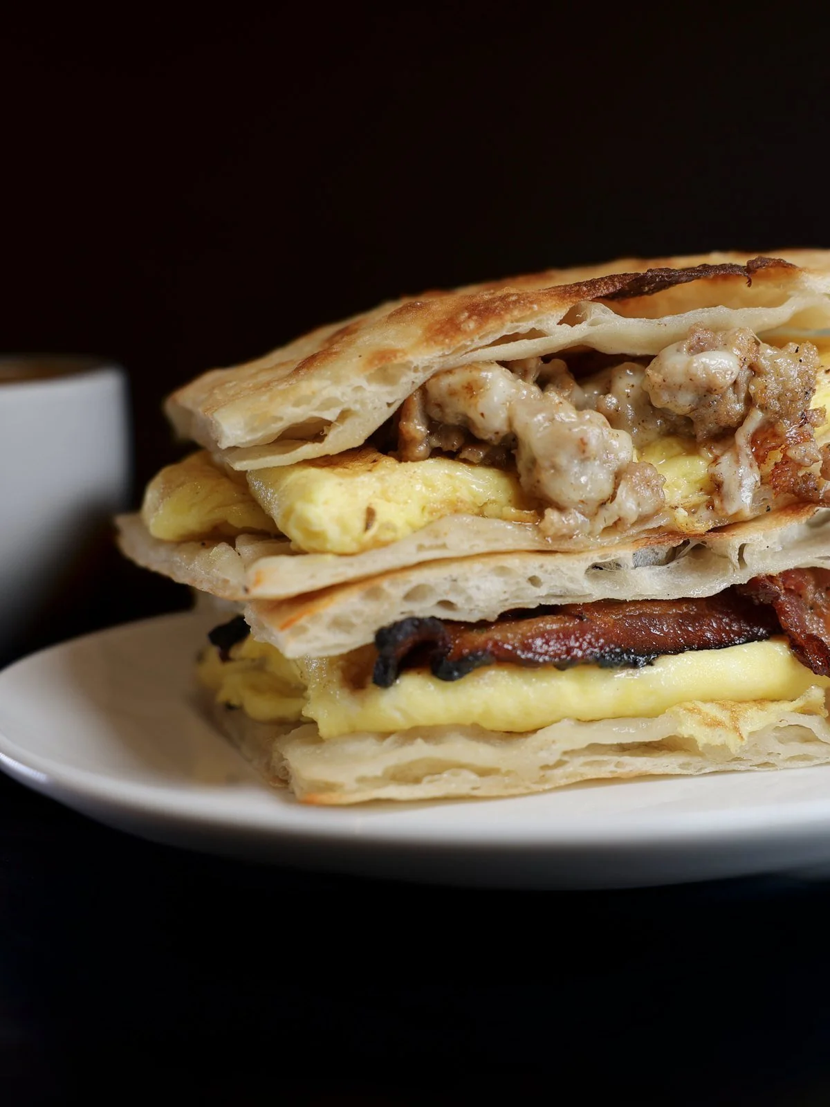Sausage, egg and cheese breakfast panini on Florenza panini bread