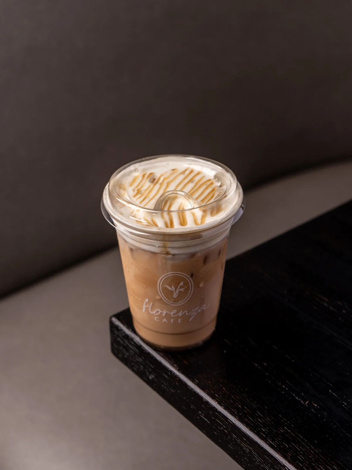 Iced latte with a caramel-colored drizzle