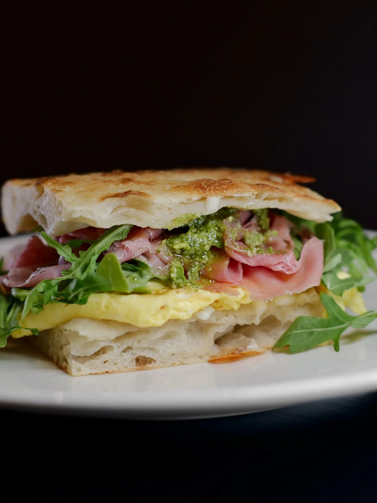 Egg Prosciutto Pesto breakfast panini on Florenza panini bread