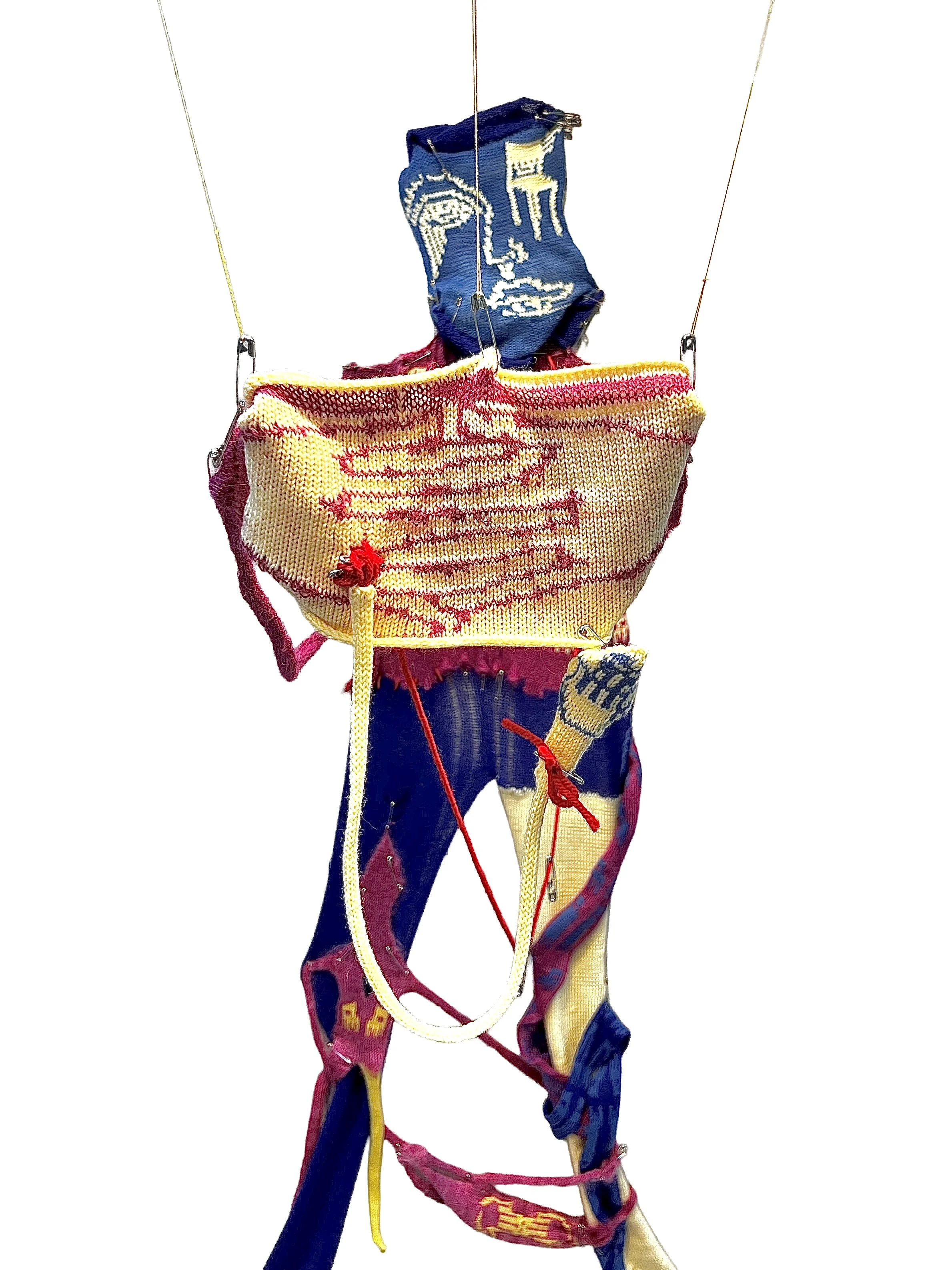 ND HG?, machine knit figure using experimental techniques & punch cards, saftey pins, red string, 2025 (view2)