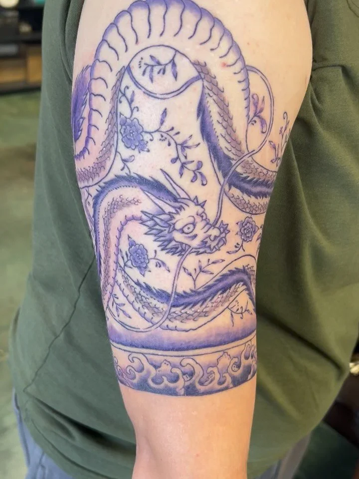 Celadon style dragon with purple 🐉💜 Designed/Done by Rena🦈 @07ch_art  Whole outlines and front part are healed, sides and inner arm are fresh! Thank you so much for trusting me!

#tattoo #tattooartist #dragontatoo