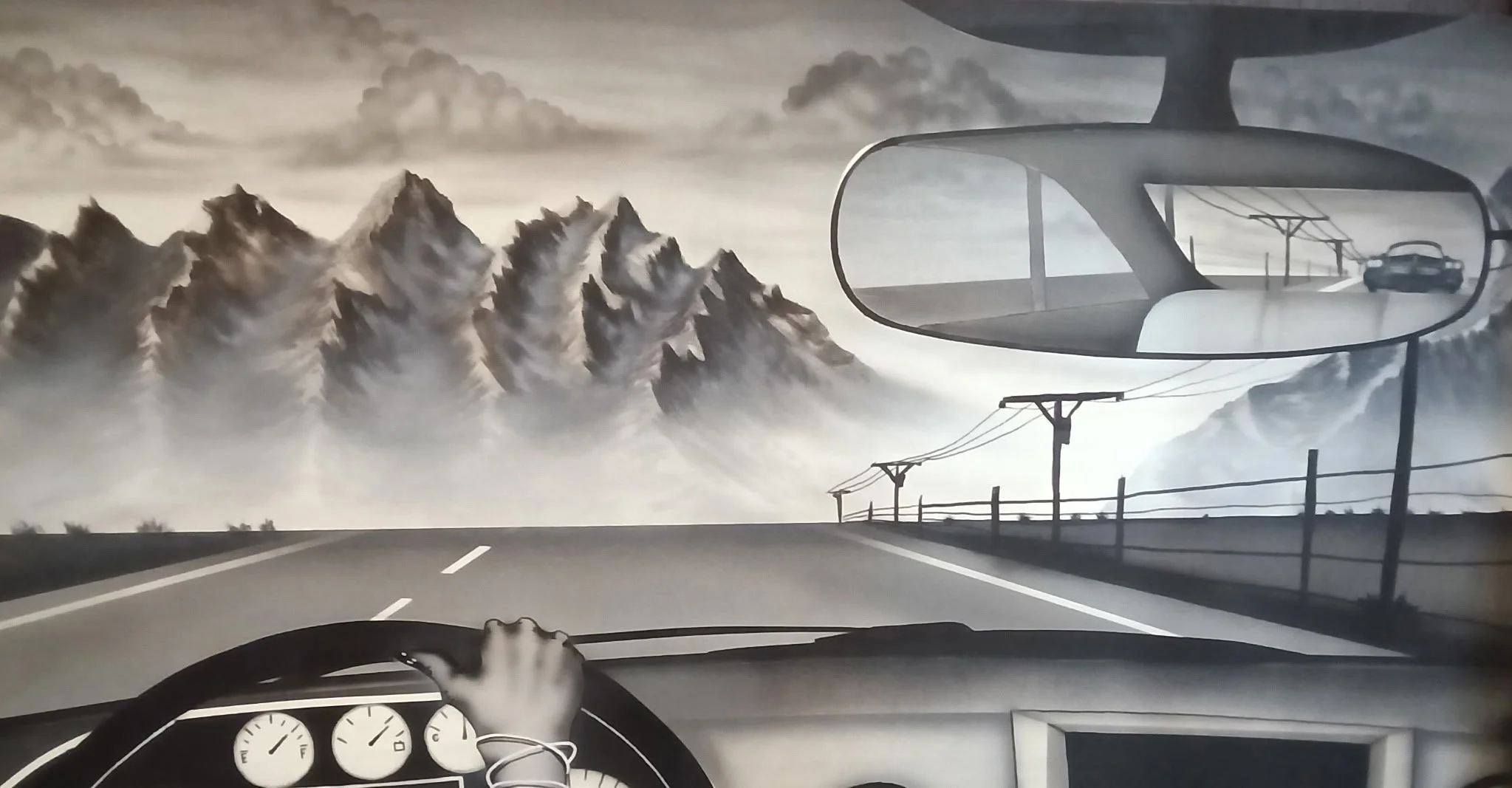A black and white painting of a person driving a car towards mountains. The rear view mirror is depicted reflecting the road and power lines going off into the distance behind the car