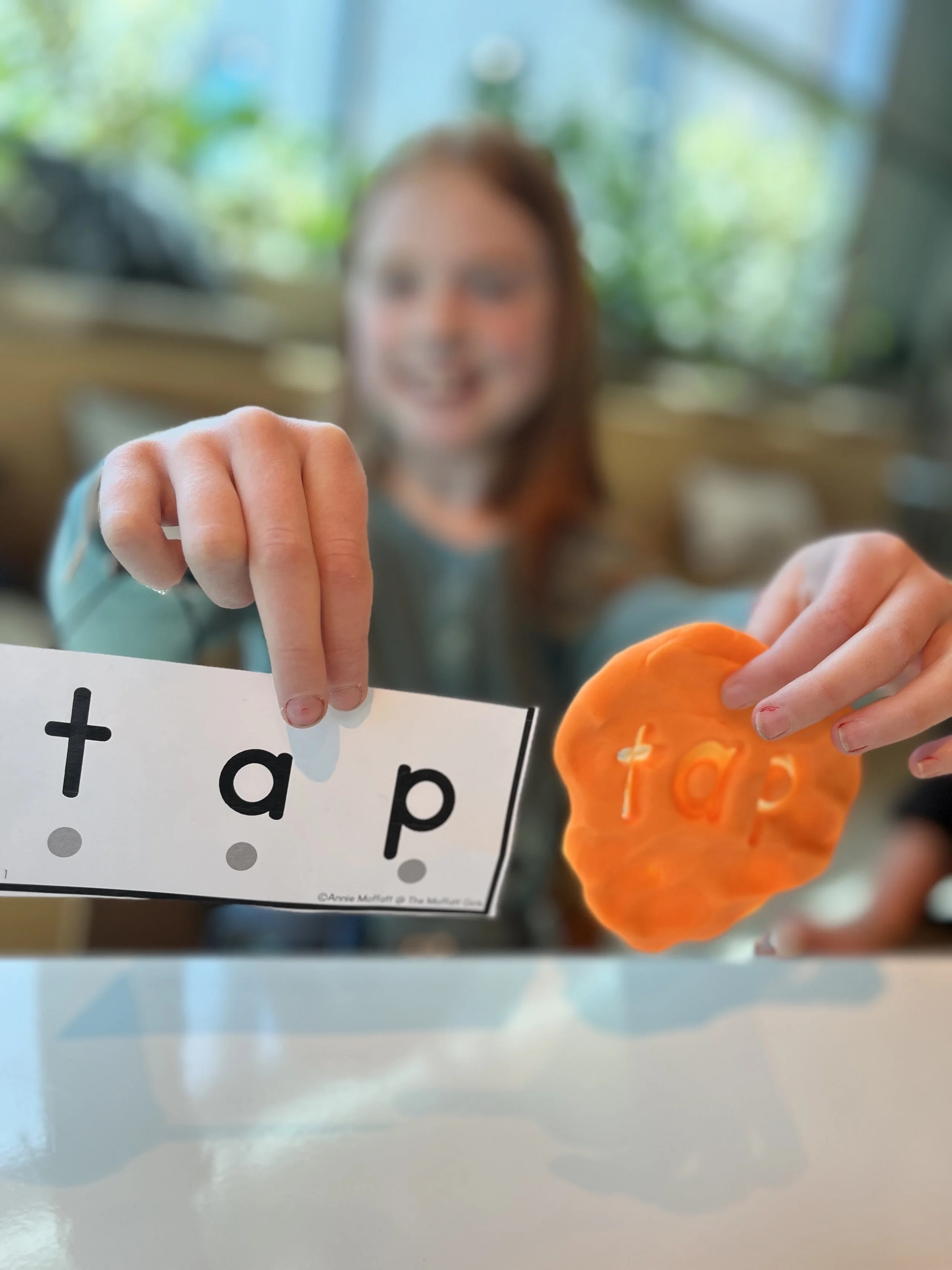 girl showing tutoring tasks at Soaring Learners