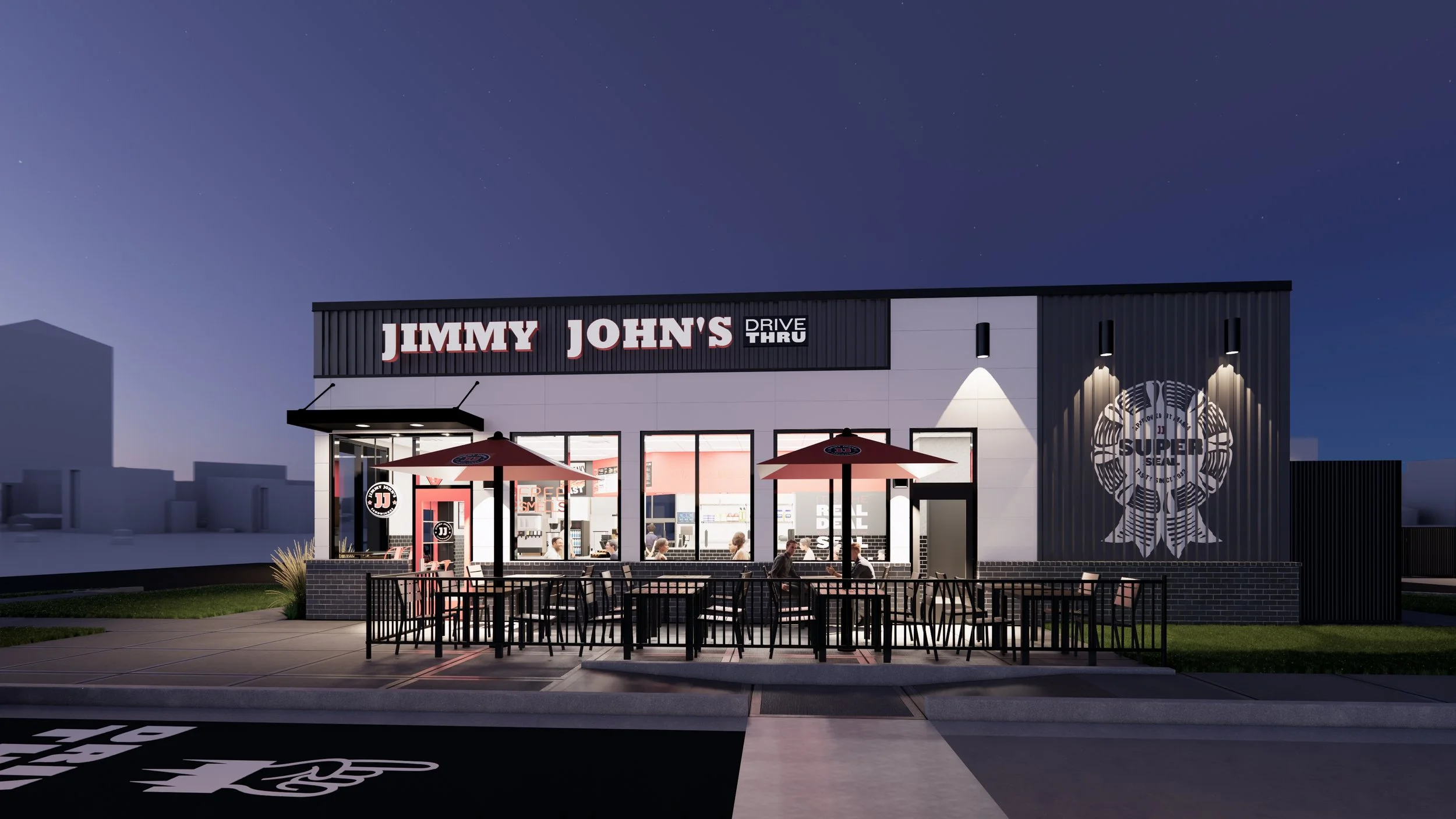 North view of the side entrance of #jimmyjohns building and outdoor seating area