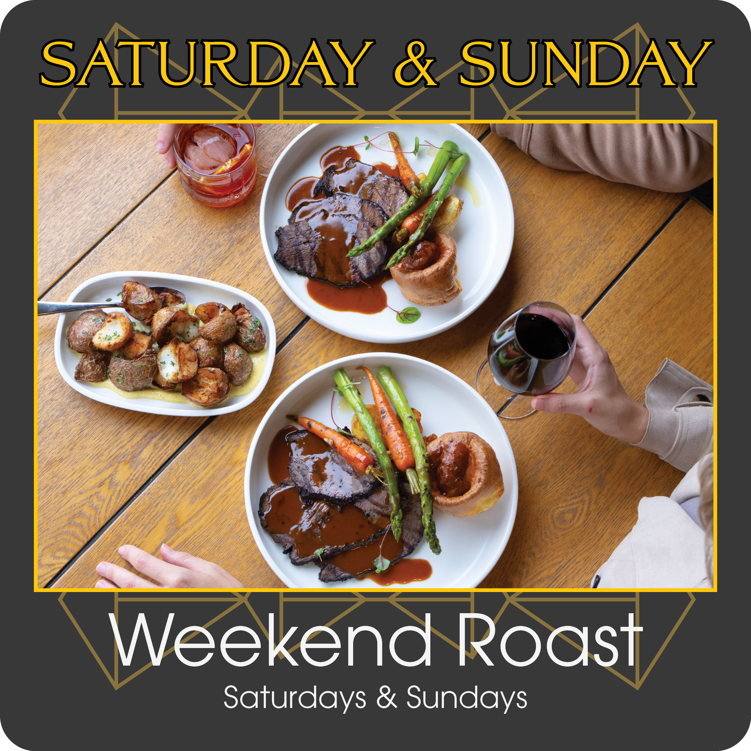 Image of a Sunday roast meal with beef, roast vegetables, and gravy, served on white plates, along with a glass of red wine and a drink with ice and lemon on a wooden table.