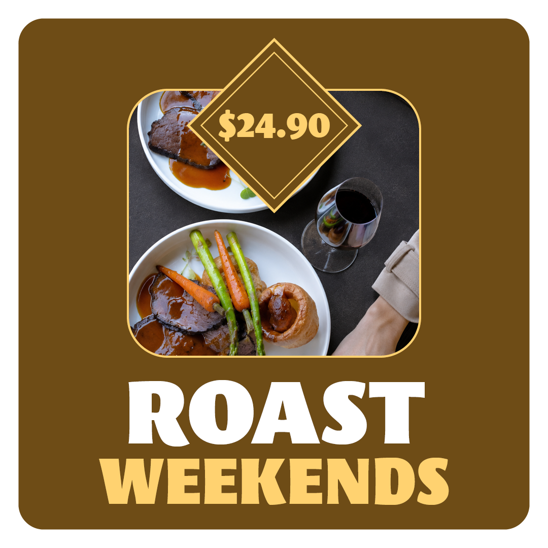 Image of a Sunday roast meal with beef, roast vegetables, and gravy, served on white plates, along with a glass of red wine and a drink with ice and lemon on a wooden table.