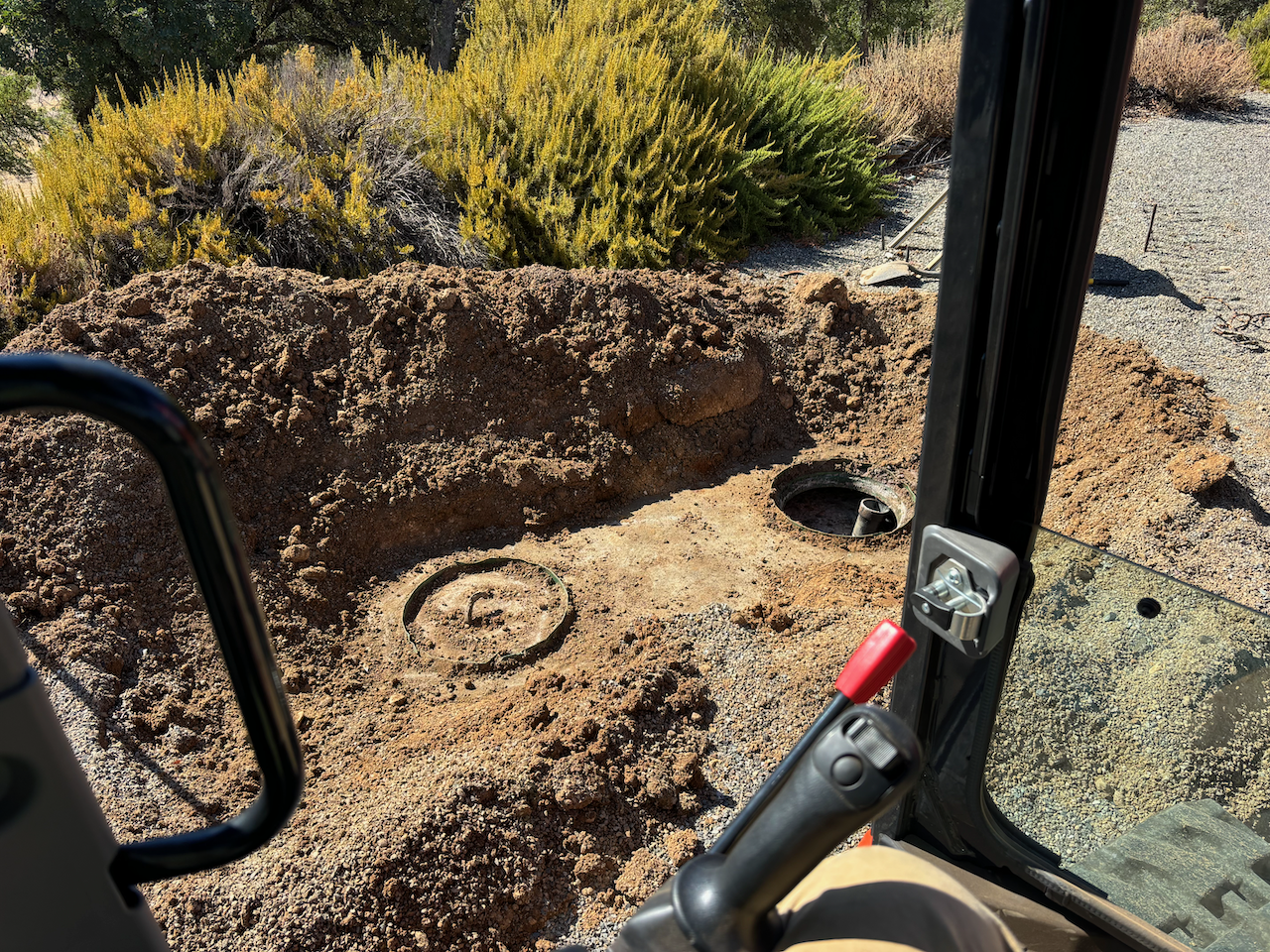 Septic riser install by Dozier Excavating.