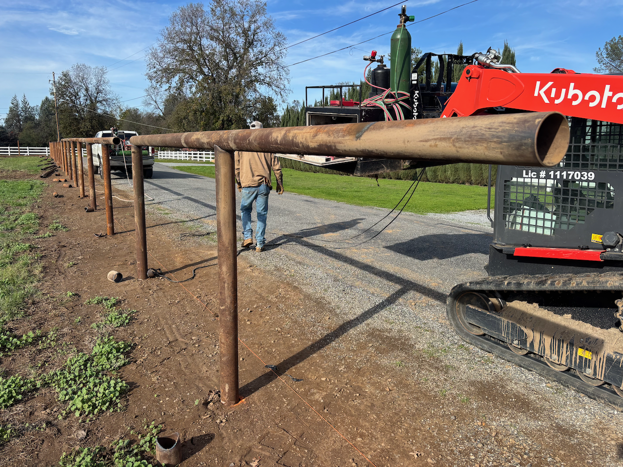 4.5" Pipe Fence Install in Palo Cedro, CA (2/5)