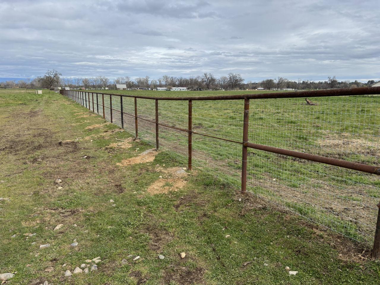 Pipe Fence Construction on Evergreen Road in Cottonwood, CA