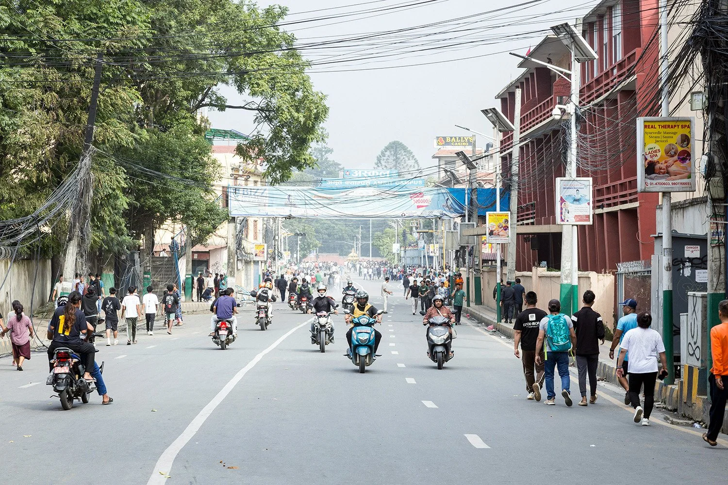 [Act II: Collision]. Traffic navigates through smoke-filled streets.
