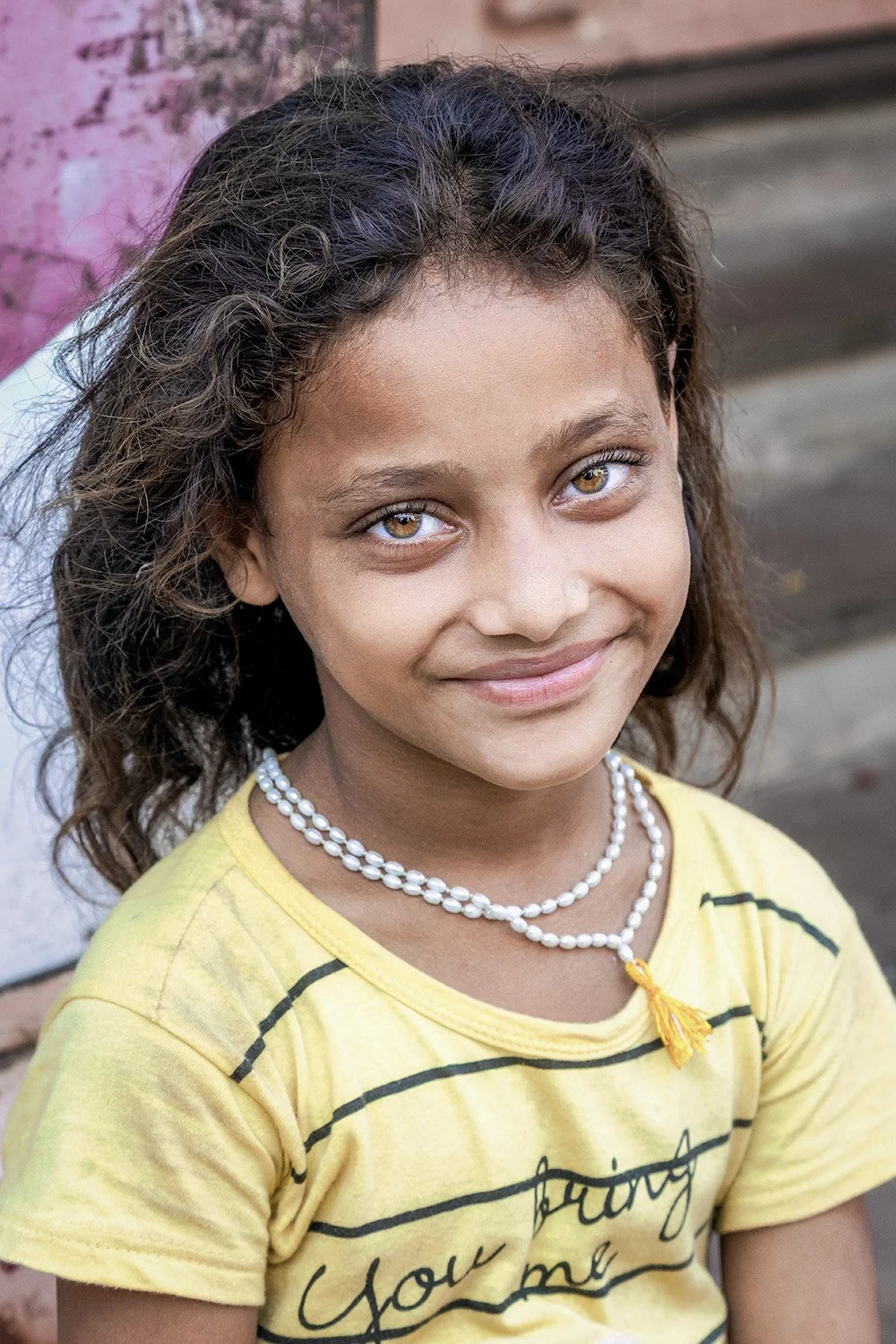 Eyes that have already seen too much.