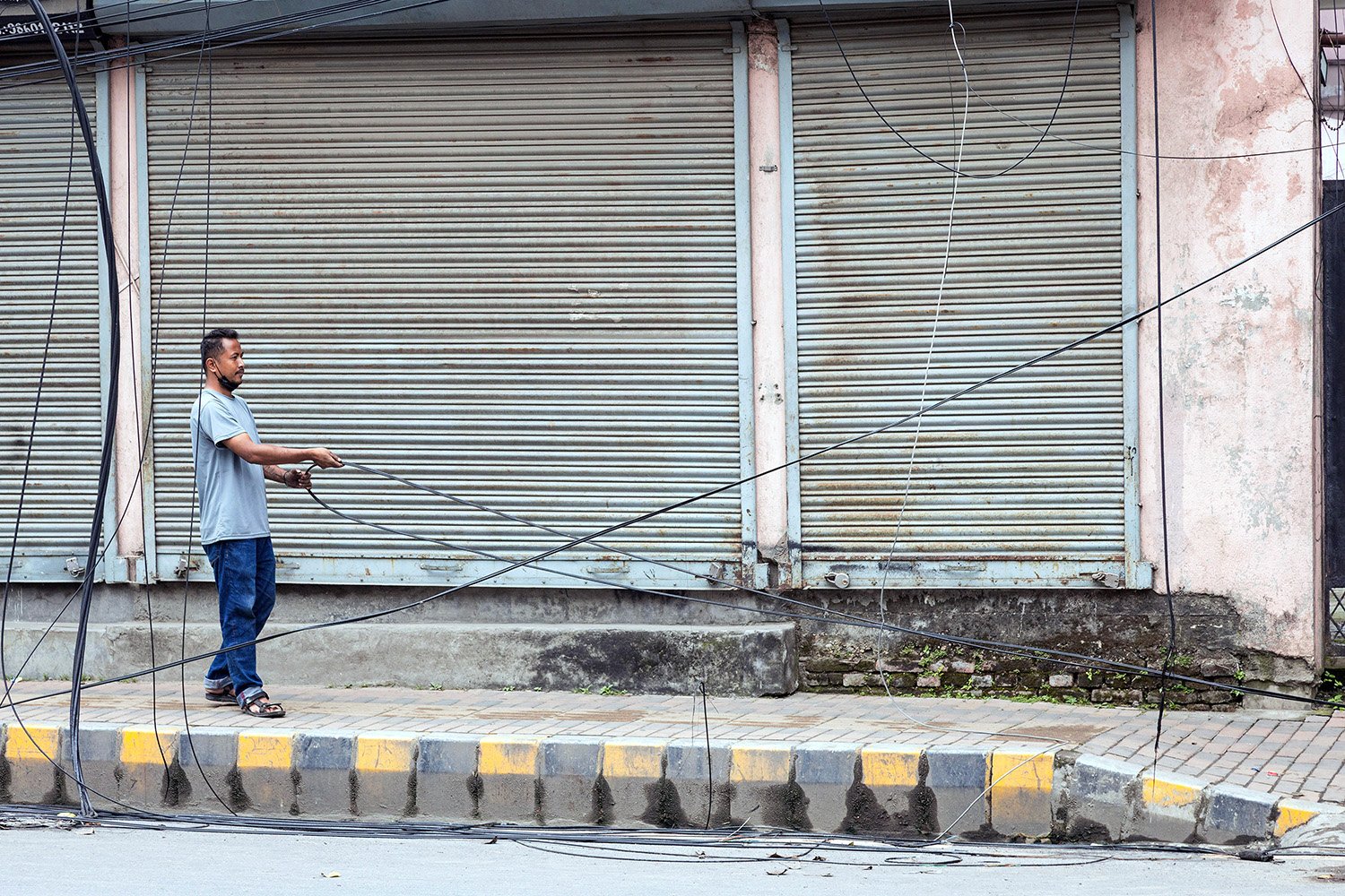 [Act III: Aftermath]. Electrical cables are rewired the day after.