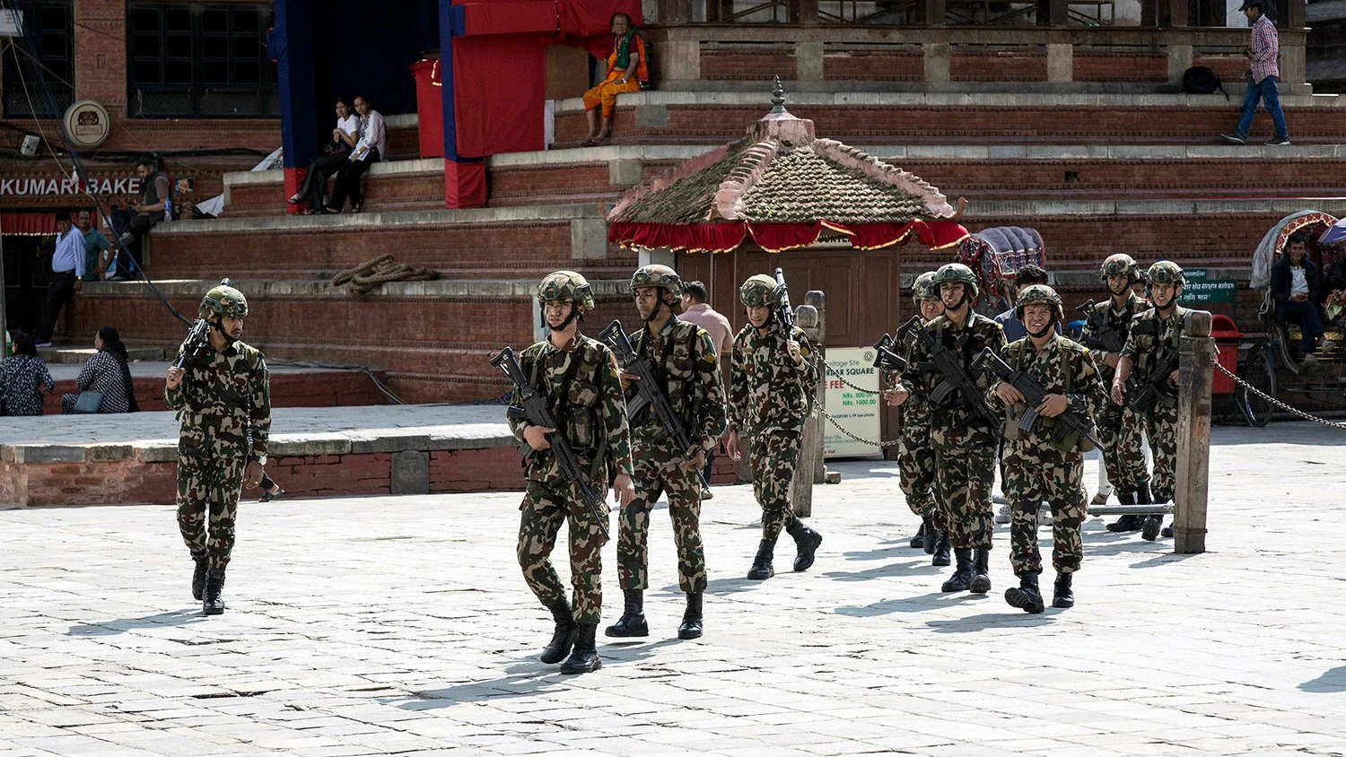 [Act II: Collision]. Army forces enter Durbar Square.