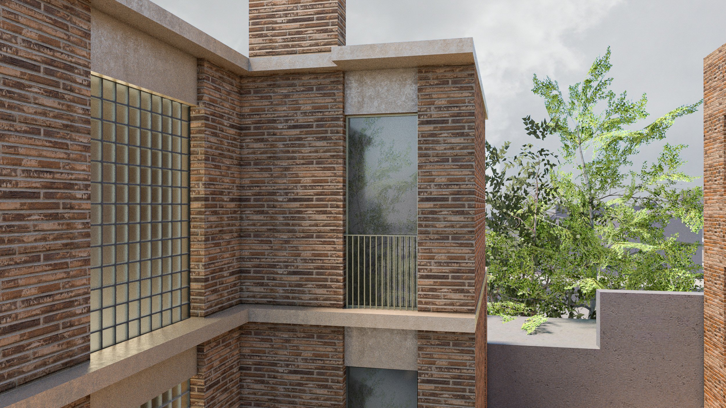 View of a modern brick building with glass block window, balcony with metal railing, and a background of green trees under a partly cloudy sky.