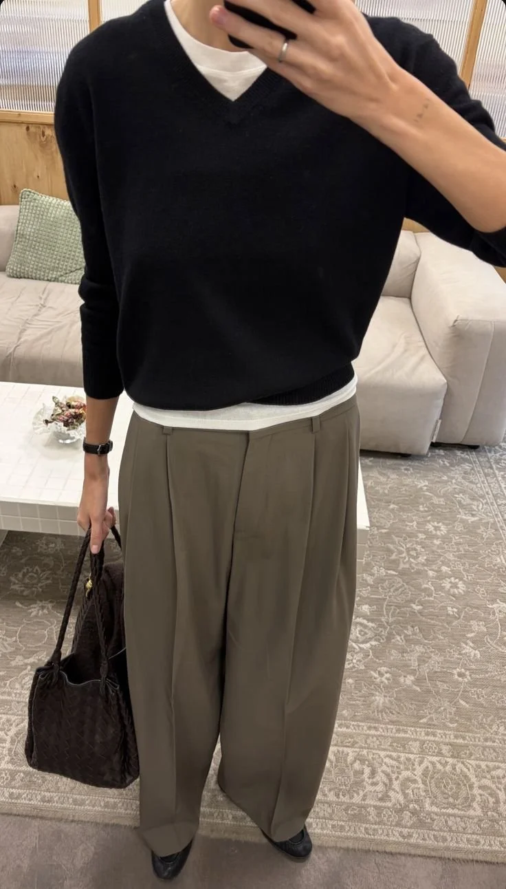 female guide to tailoring black sweater.jpg