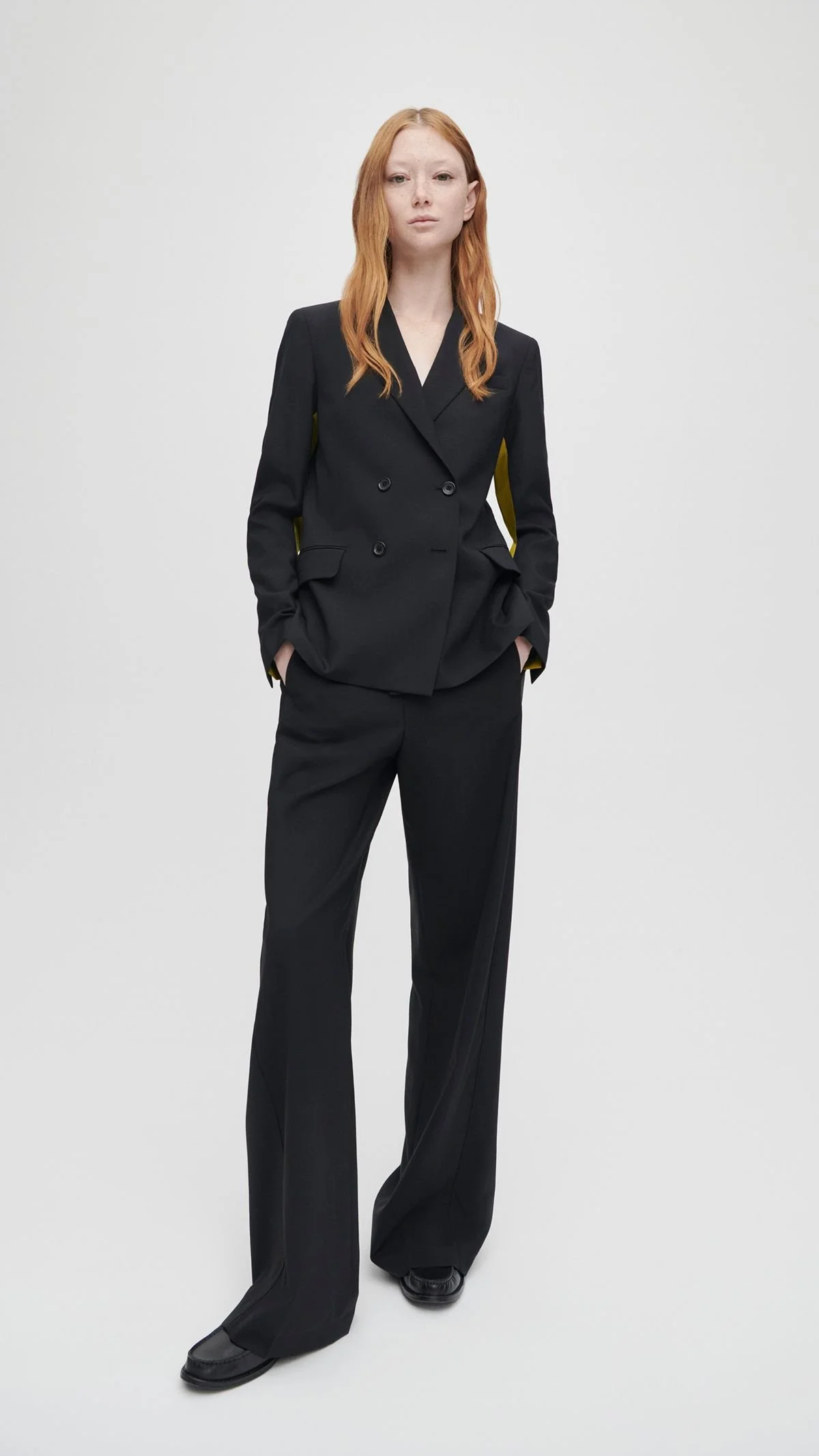 female guide to tailoring black suit.jpg