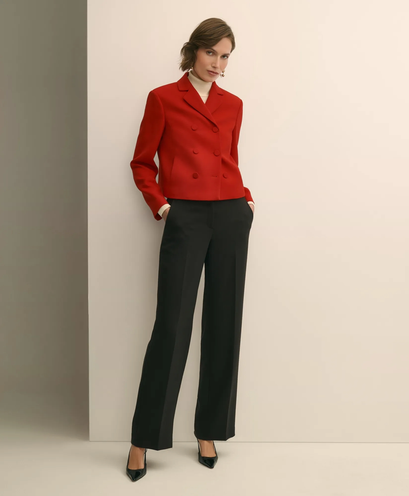 a woman wearing a red blouse