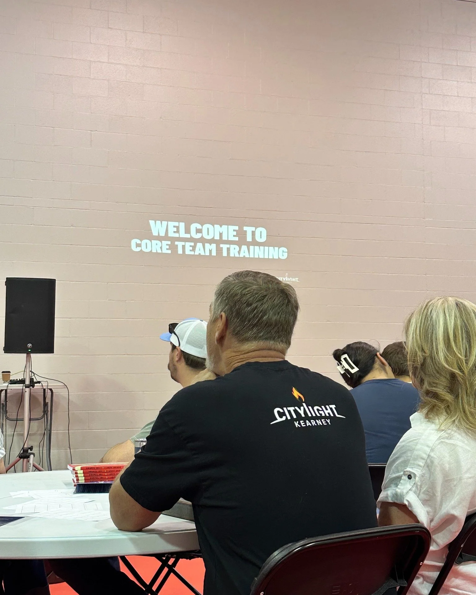 One year ago, we officially began gathering as Citylight Kearney!!!!!

We started around tables on those iconic red gym floors at Schrock Medical Clinic, walking through Gospel 101 together. Week by week, we explored the heart of the Gospel, what it 