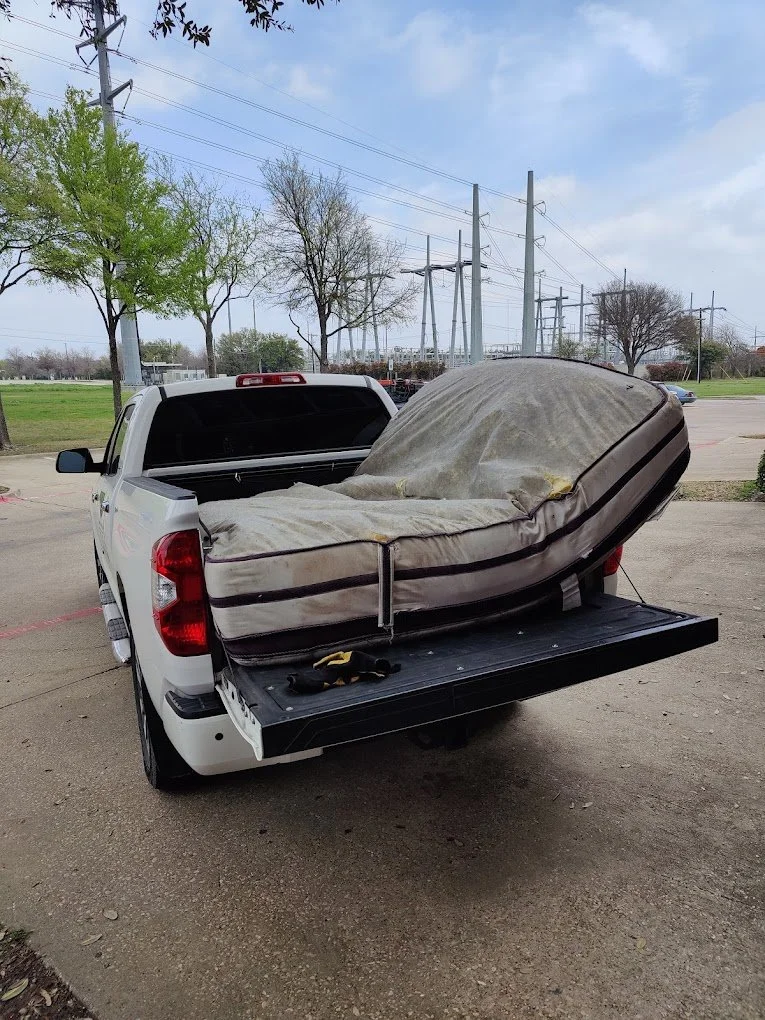 Quick Junk Removal truck providing junk removal service in Plano TX