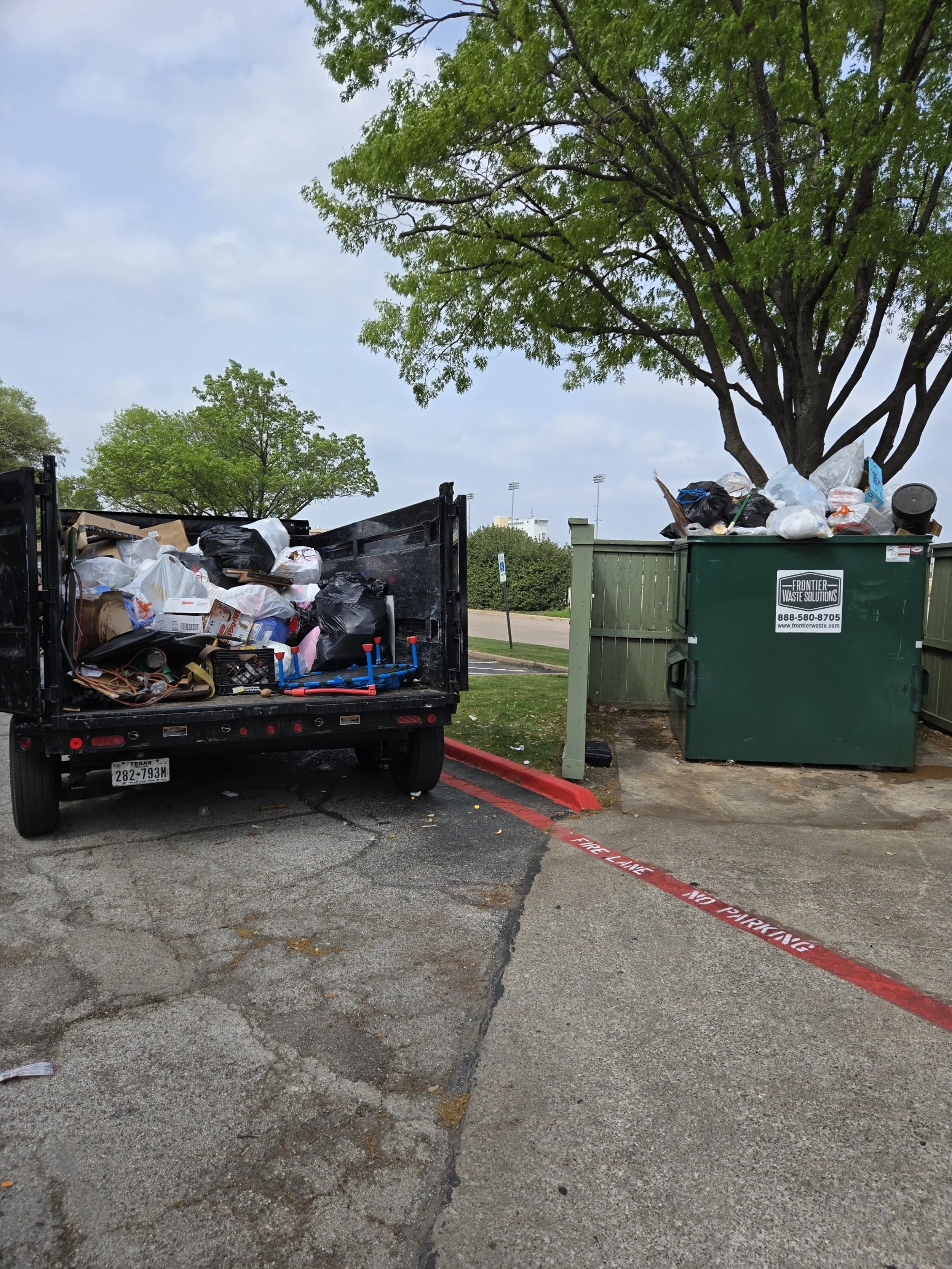 Half trailer junk removal load in Plano, TX during residential cleanout service
