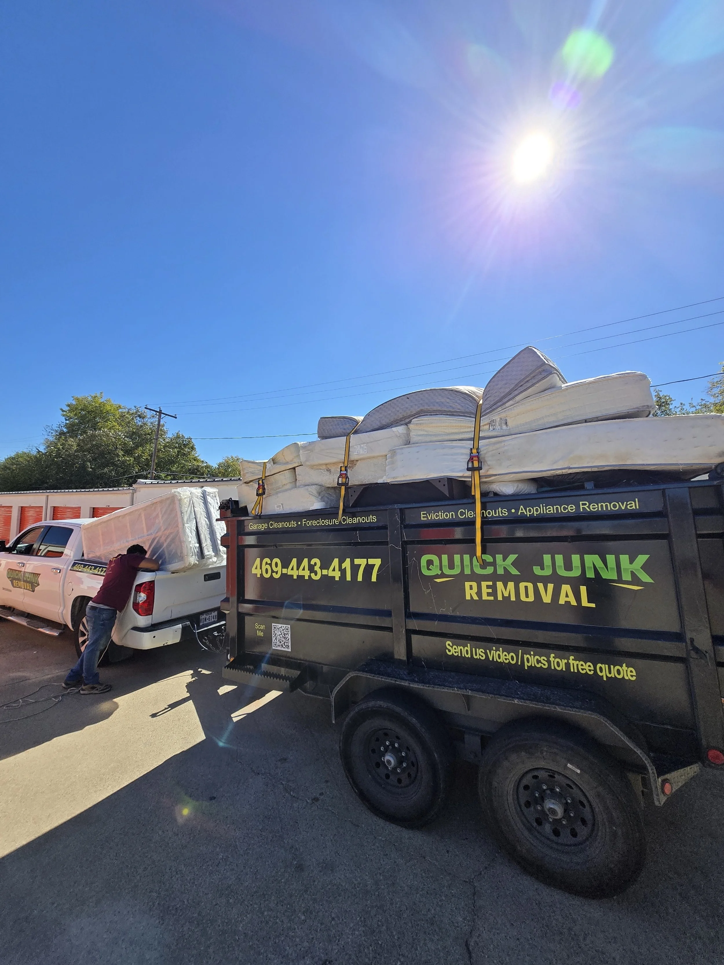 Old mattress removal in Plano, TX loaded onto a pickup truck for hauling and disposal.