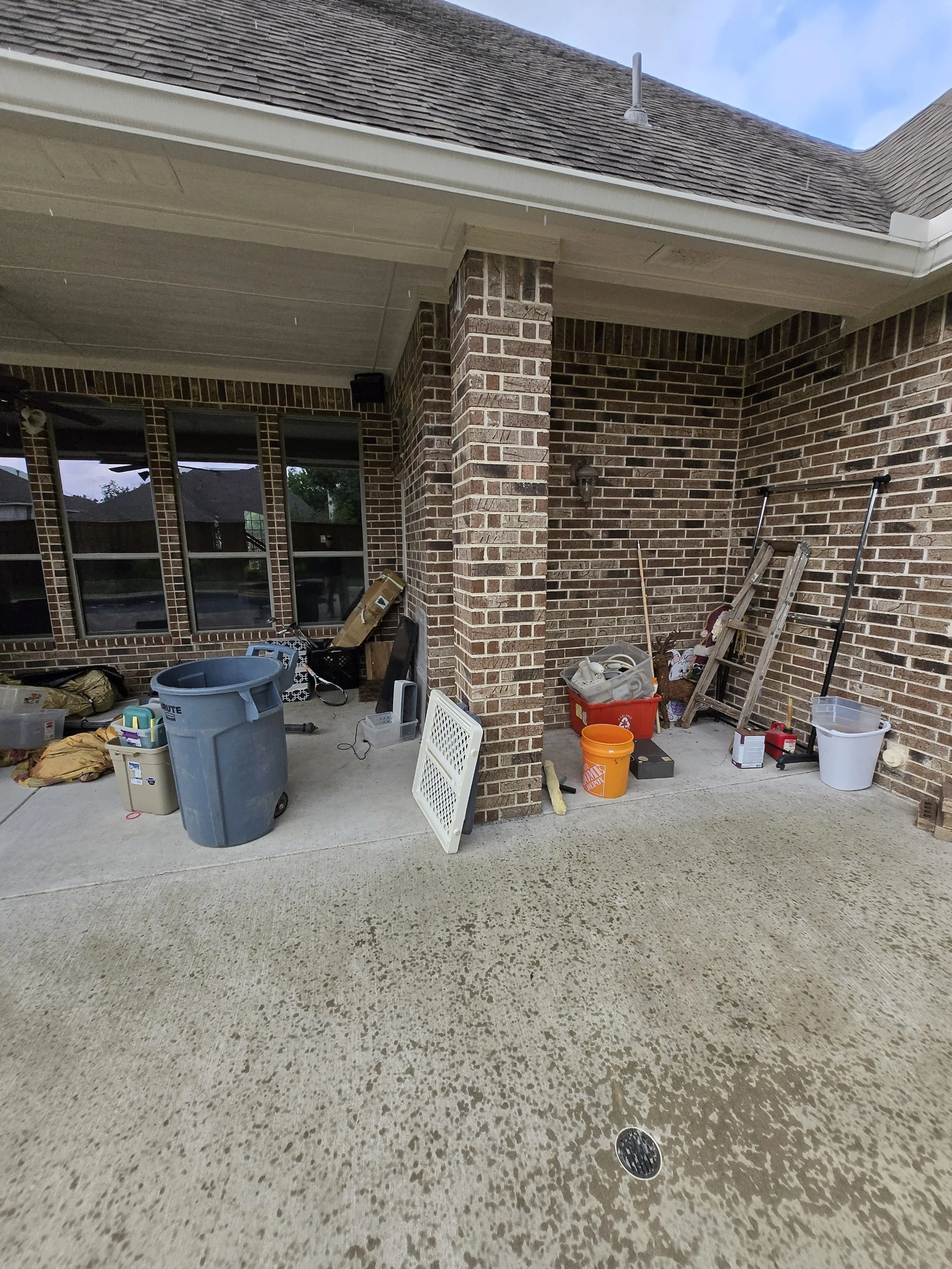 Patio cleanout before junk removal – cluttered outdoor space in Plano TX.