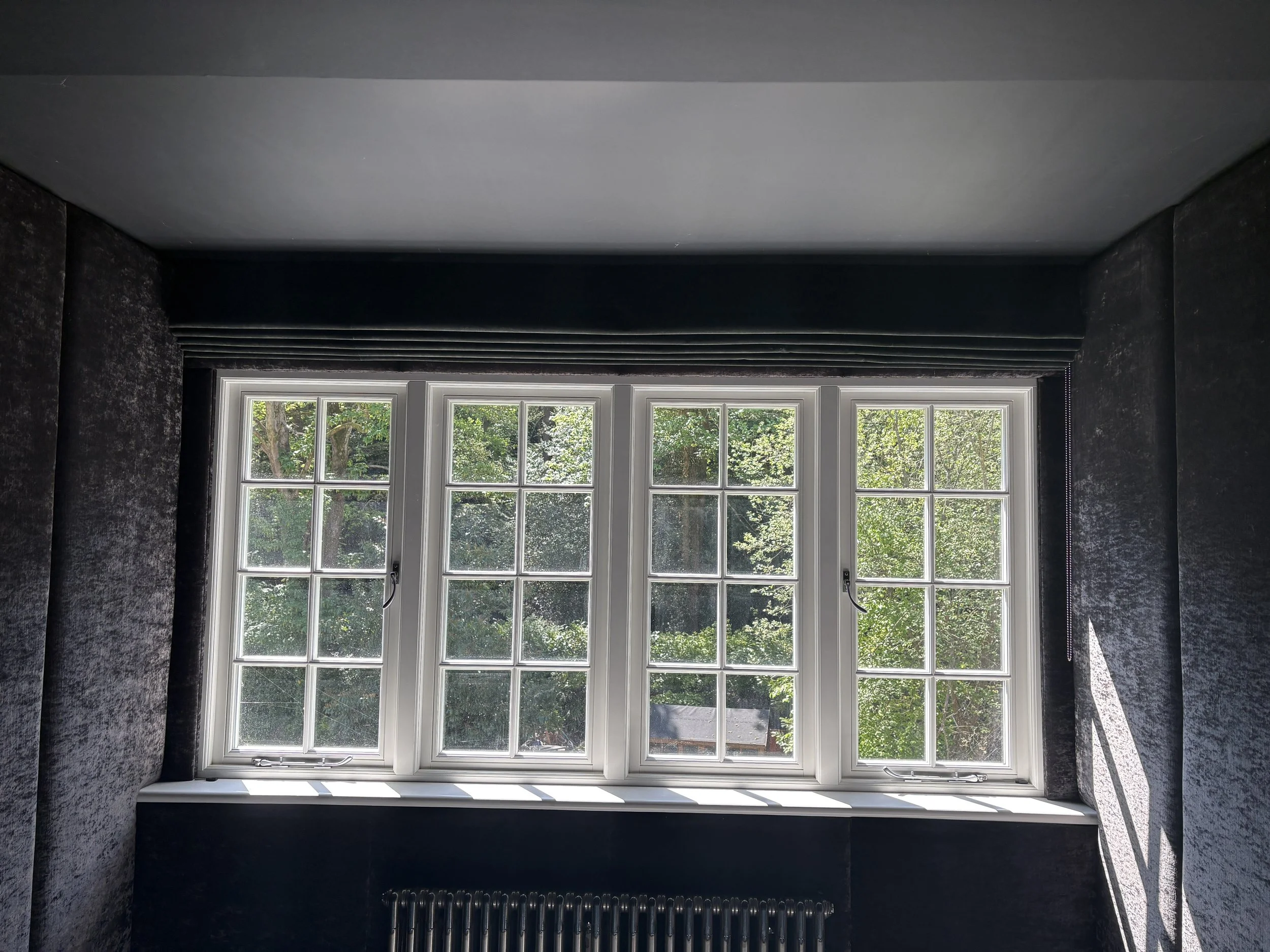 Blackout Roman Blind in cinema room. 