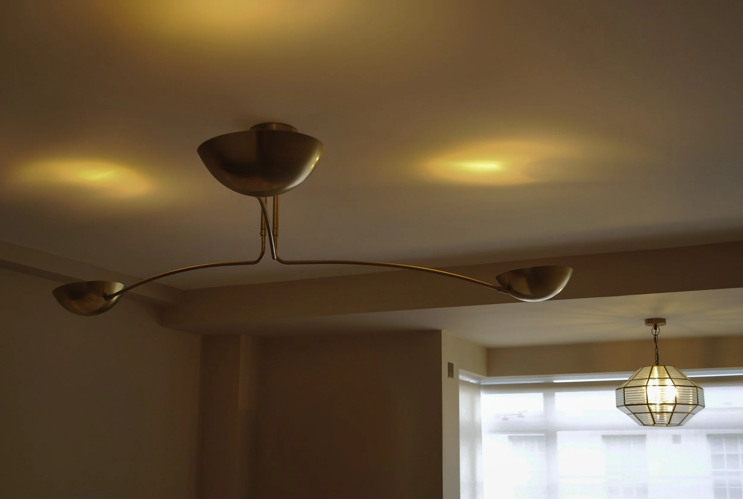 Completed ceiling lighting layout with recessed and decorative fittings