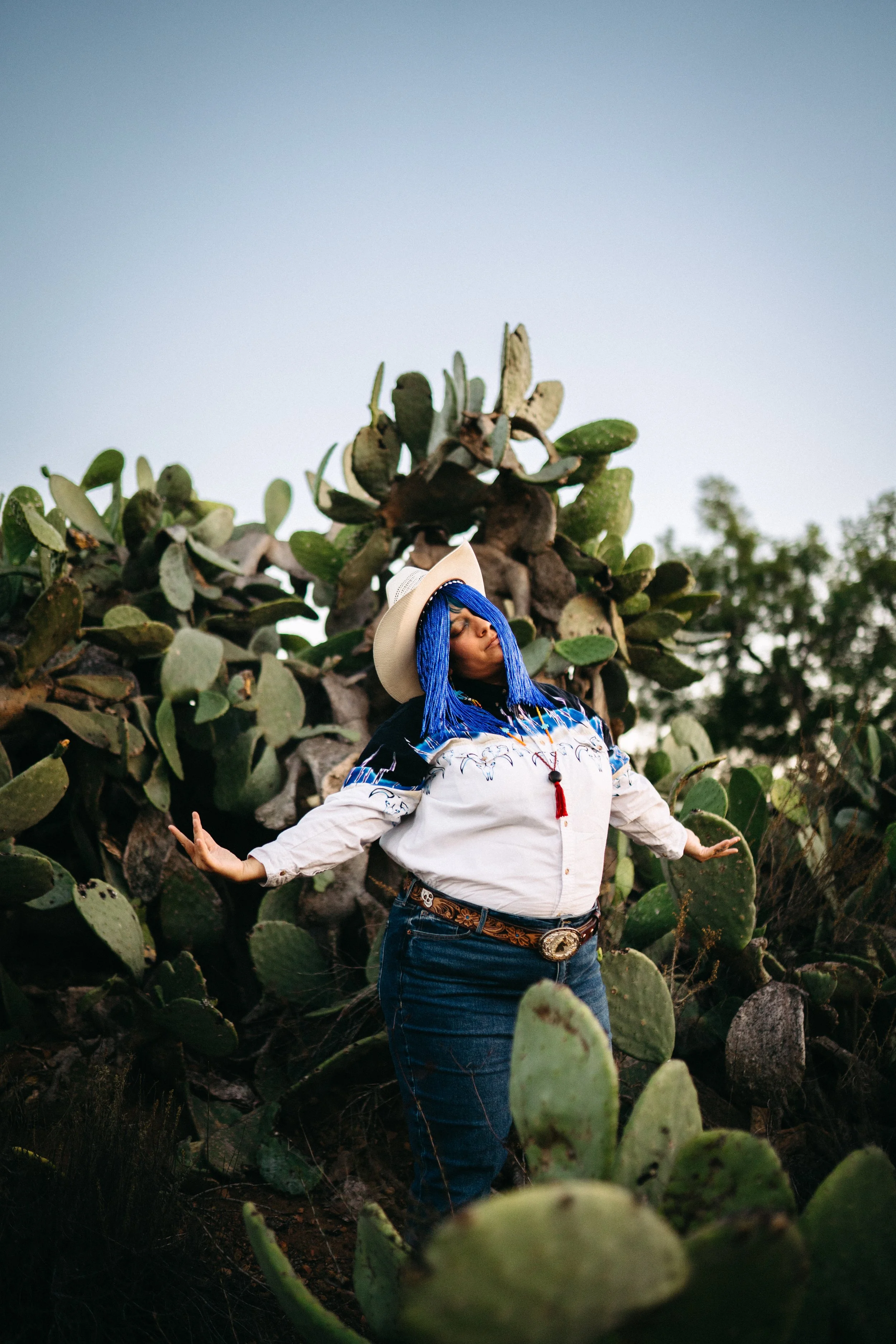Photoshoot by Captured by Ana Fall 2025. This photoshoot expresses my masculinity, gender expansiveness, and Indigenous Yoeme identity. 
