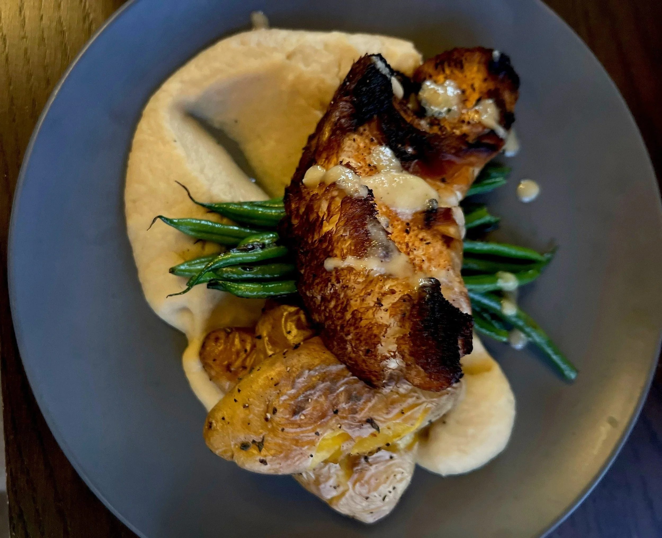 The McLemore Resort Smoked Lion's Mane steak plate with Gowin Valley Farms mushrooms