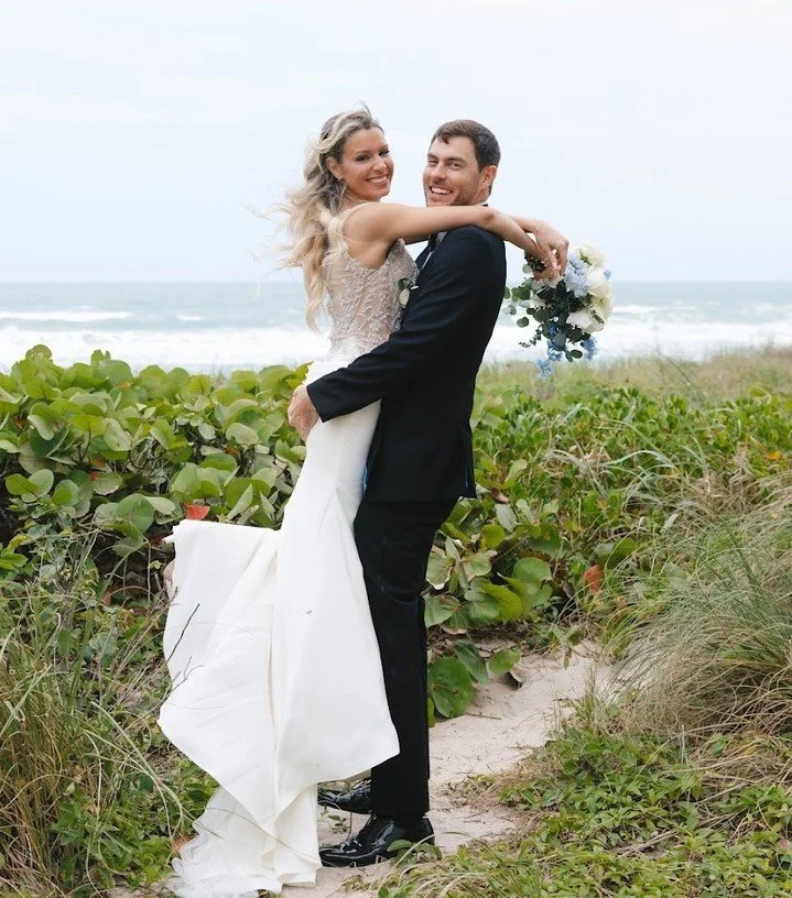 He swept her off her feet. Literally. 🤍
Ashton &amp; Michael's beach portraits had all the energy- soft blue florals, ocean air, and two people who couldn't stop smiling.

Planning: @stephanieverrmareventco @stephanieverrmar 
Photography: @berkleymc