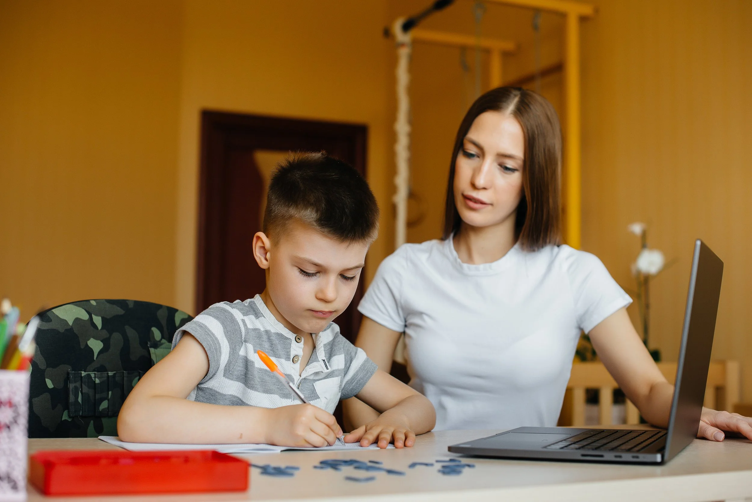 mother-her-child-are-engaged-distance-learning-home-front-computer-stay-home-training.jpg
