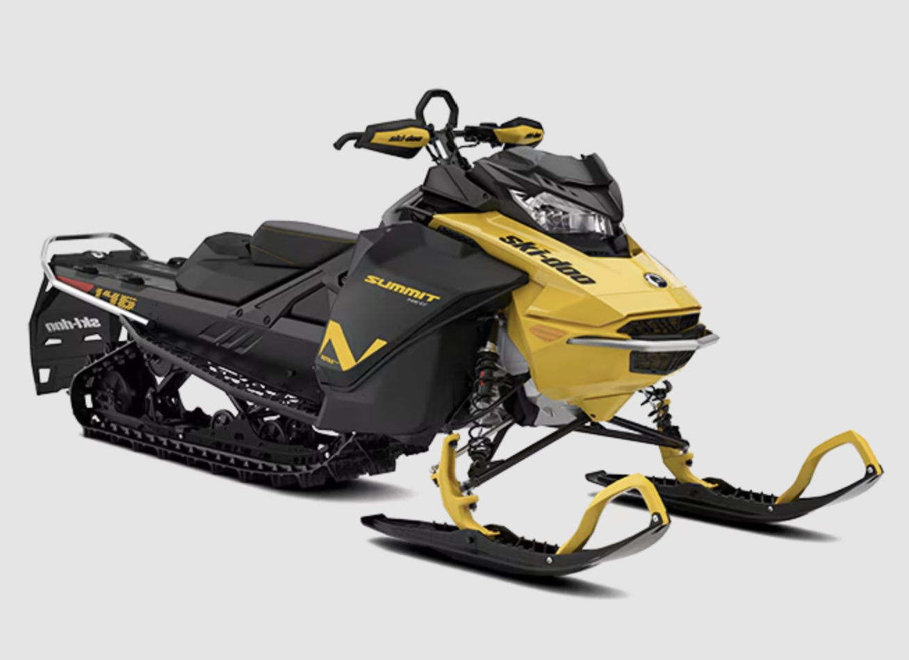 Yellow and black Ski-Doo snowmobile with Summit label.