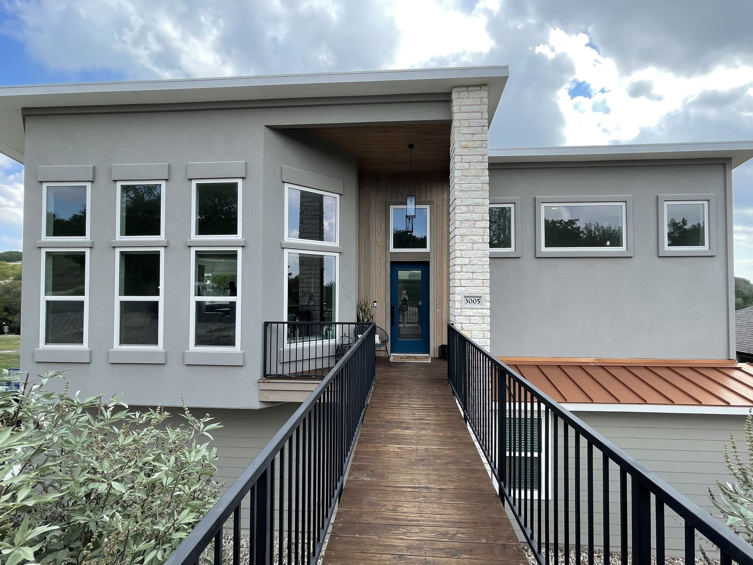 Tinted sliding doors providing privacy without sacrificing natural light.