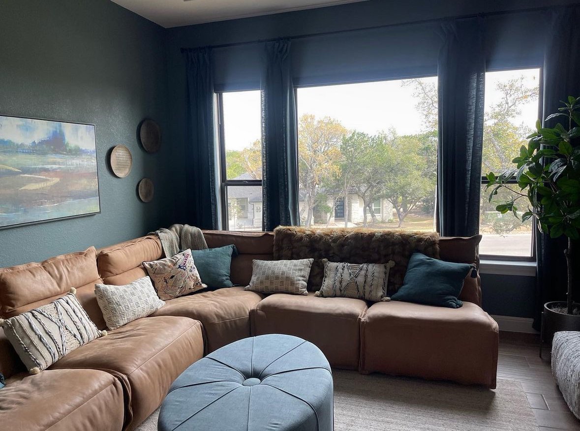 Leander home with clear, high-performance film on floor-to-ceiling windows.