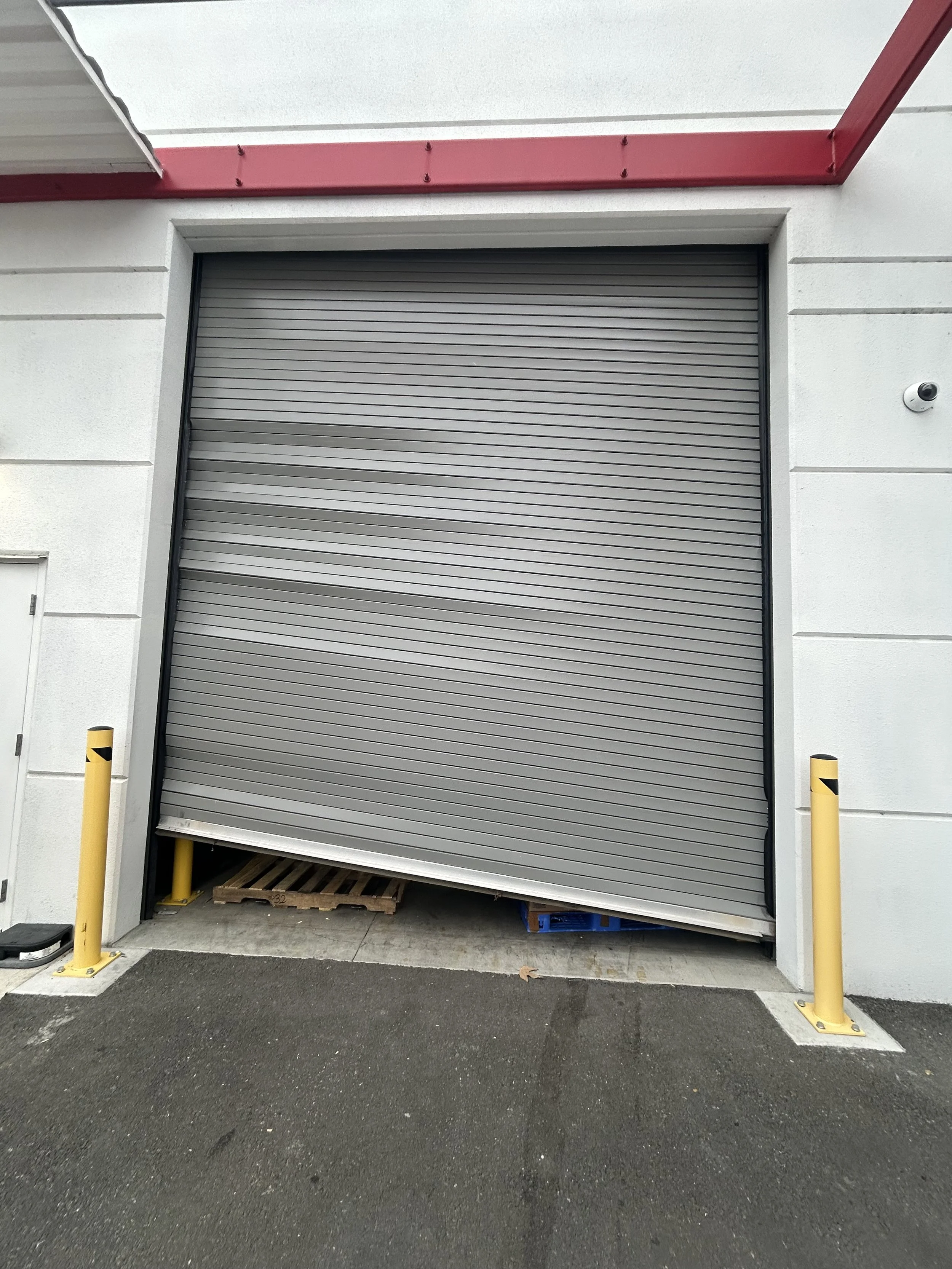 Crooked rolling steel door repaired by R&S Concord