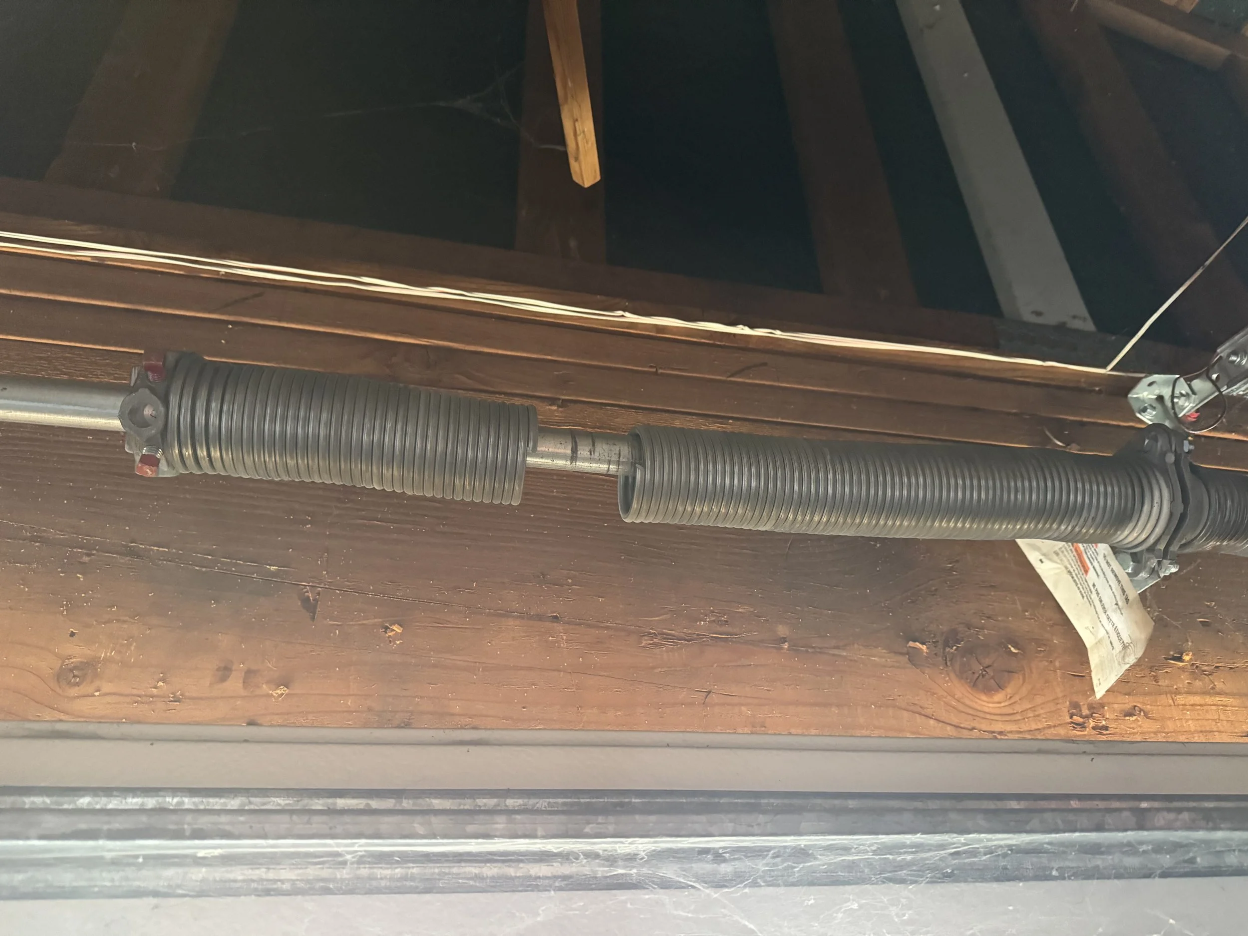 Garage door with broken spring in Pleasanton, CA