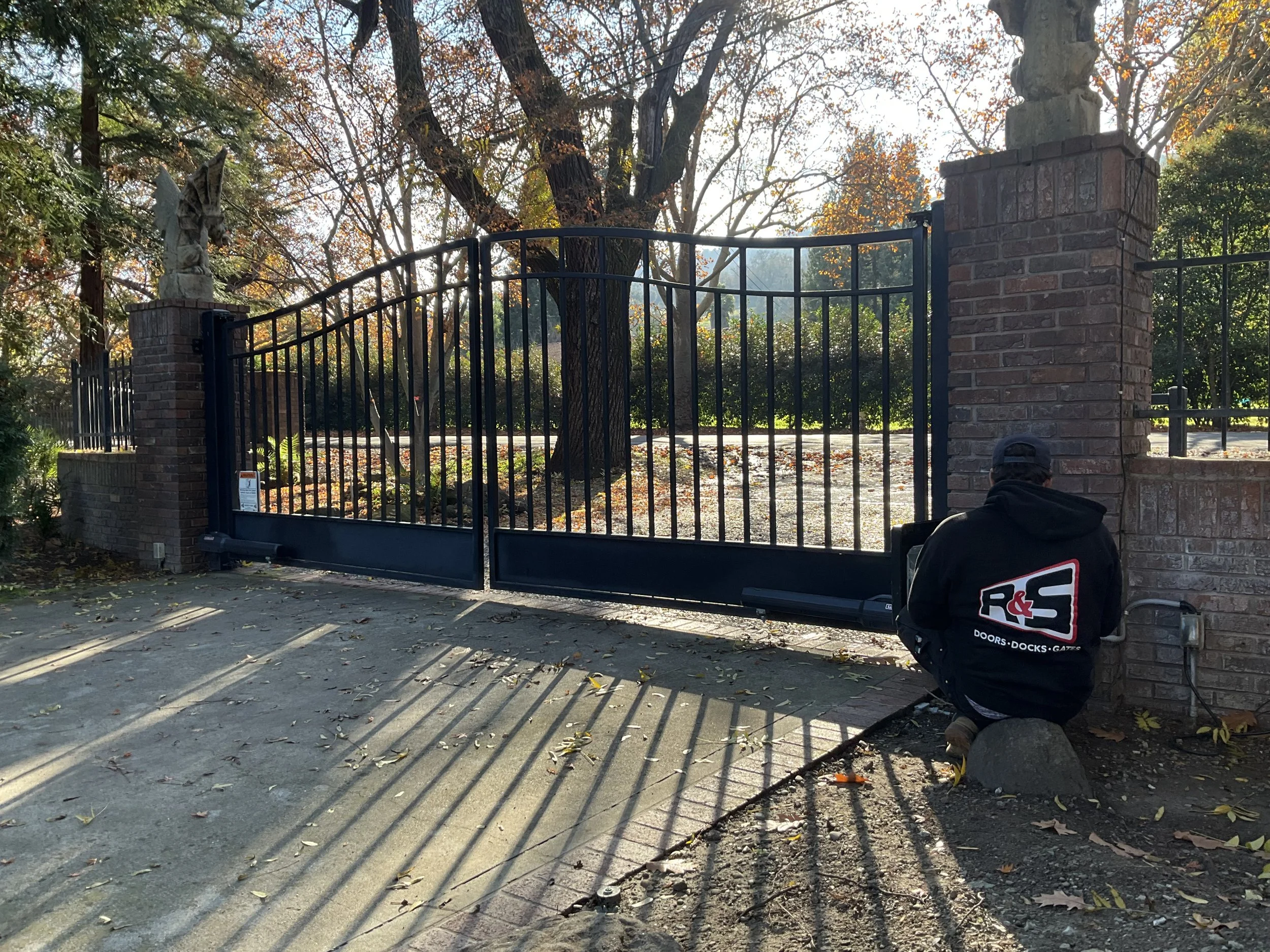 R&S Concord gate technician repair bi-parting swing entry gate