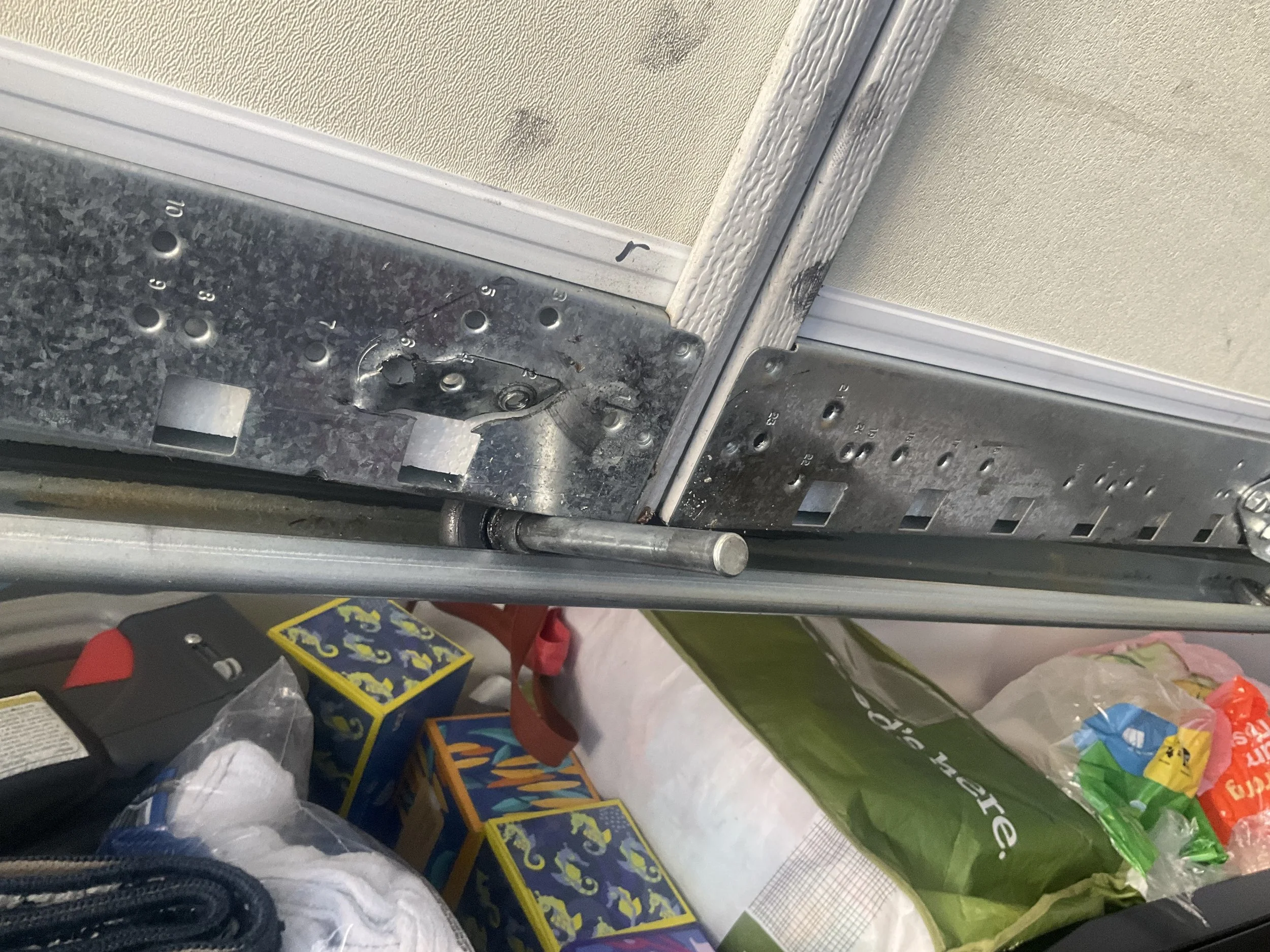 Broken garage door hinge in Pleasanton, CA